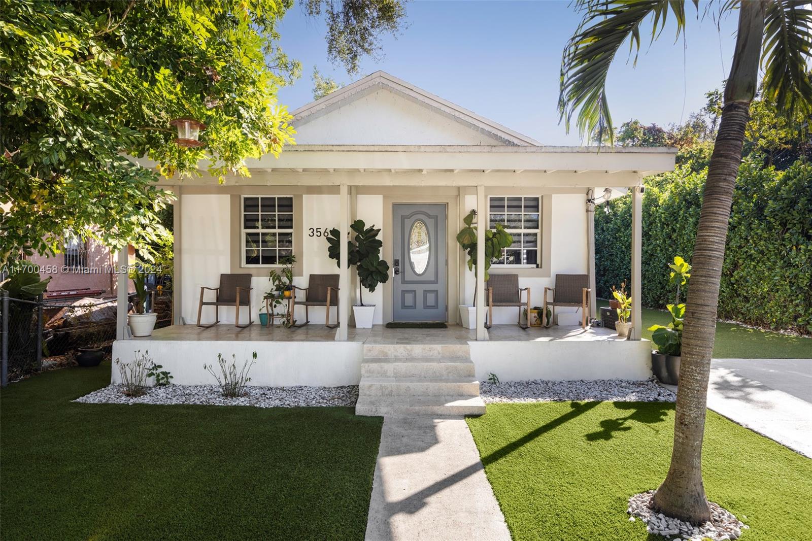Captivating home with welcoming front porch in the historic village of Coconut Grove. Just a short walk to trendy galleries, boutiques, cafes and bayfront parks & marinas. Totally renovated in 2020. Enter into light-filled living spaces with an open layout and porcelain tile flooring throughout. Lovely kitchen features wood cabinetry, quartz countertops & stainless appliances. The residence has 4BR’s (2 en-suite) with custom closet systems in each + 3 new designer bathrooms. Additional features include: all PVC plumbing, 2020 new HVAC + washer/dryer. Enjoy outdoor living in the low maintenance tropical garden w/ high quality astro turf which surrounds the home. Ample room to add a pool. Minutes drive to downtown, MIA, Key Biscayne & the Beaches.