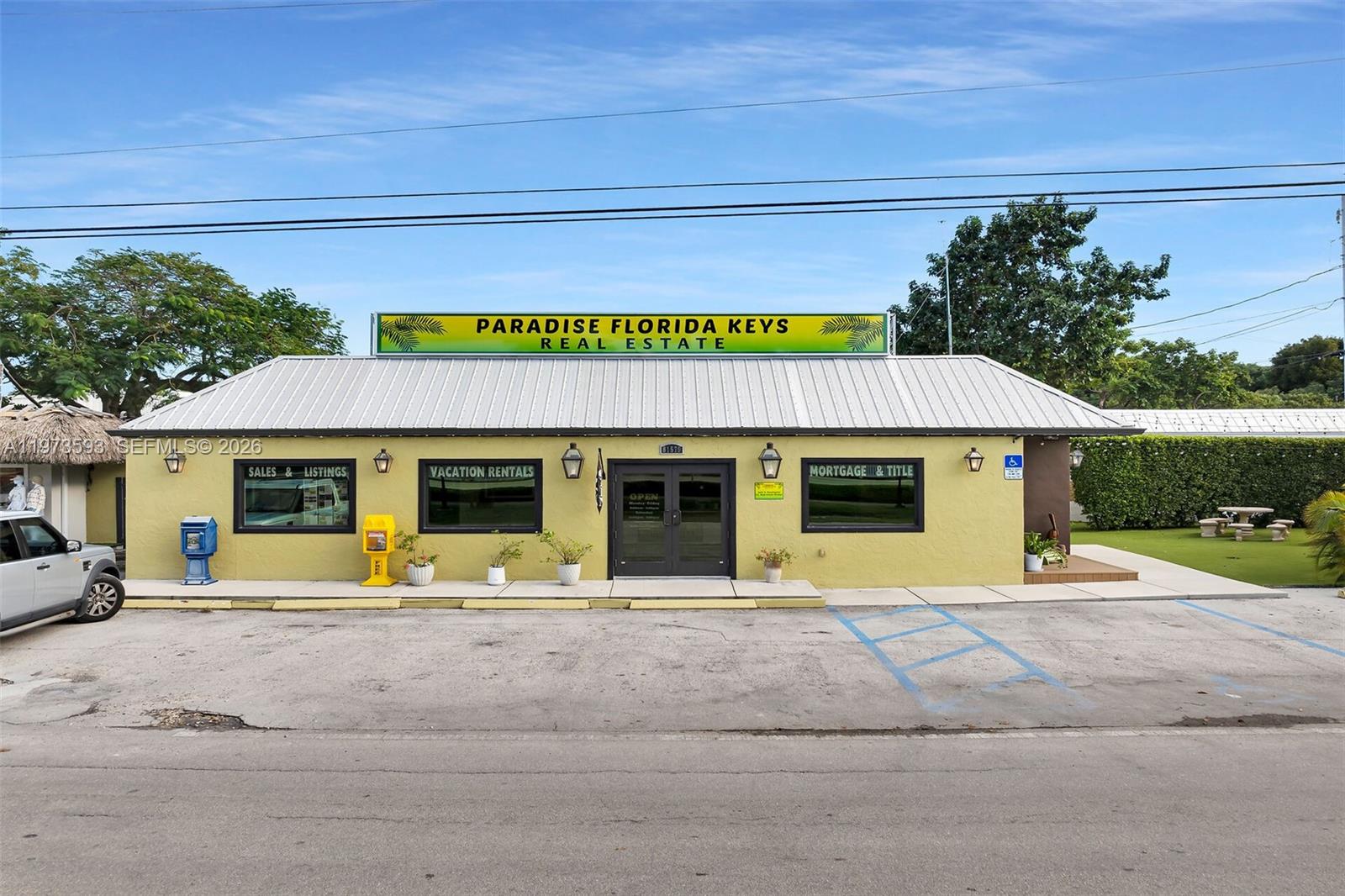 This is an exceptionally rare chance to secure a versatile mixed use commercial property in Islamorada's most established business corridors. With prominent highway frontage, excellent visibility, and steady traffic exposure, theses three building are ideally positioned for a wide range of commercial uses.  making it an appealing option for investors and owner-operators. The building features a practical, adaptable layout suitable for professional offices, medical or wellness services, boutique retail, administrative operations, or specialty businesses. Large front-facing windows bring in natural light and enhance street presence, creating an inviting entry point for customers and clients.  The footprint also supports the creation of private offices, treatment rooms, or storage areas, allowing businesses to tailor the space to their operational needs. On-site parking adds significant value, providing convenient access for customers and employees--an important advantage in Islamorada's commercial zones. Excellent signage opportunities ensure strong brand exposure. Easy ingress and egress make the location suitable for both destination-based and walk-in business models. Surrounded by established businesses, restaurants, marinas, and residential neighborhoods, the property benefits from a diverse and active customer base. Islamorada's strong local economy enhances the long-term appeal of this location. Totally renovated in 2019. Business is not part of thr sale.