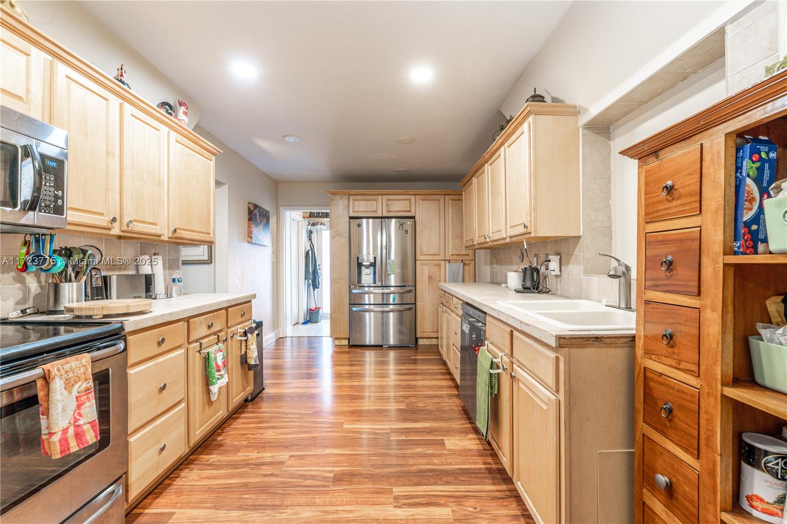 OPEN HOUSE SUN 1/26 12PM - 3PM This charming 3-bedroom, 2-bathroom gem offers the perfect blend of comfort and convenience. Featuring a brand-new metal roof, AC from 2024 and a fully fenced-in yard, this home is ideal for creating lasting memories with family and friends.The galley-style kitchen is both functional and stylish, boasting stainless steel appliances that make cooking a breeze. Enjoy peace of mind with a low HOA of just $50, while taking advantage of the community pool and clubhouse—perfect for birthday parties.Nestled in a prime location, you’re just minutes from shopping, dining, and major highways, making your daily commute and errands a breeze.Don’t miss this opportunity to make this beautiful property your new home sweet home!