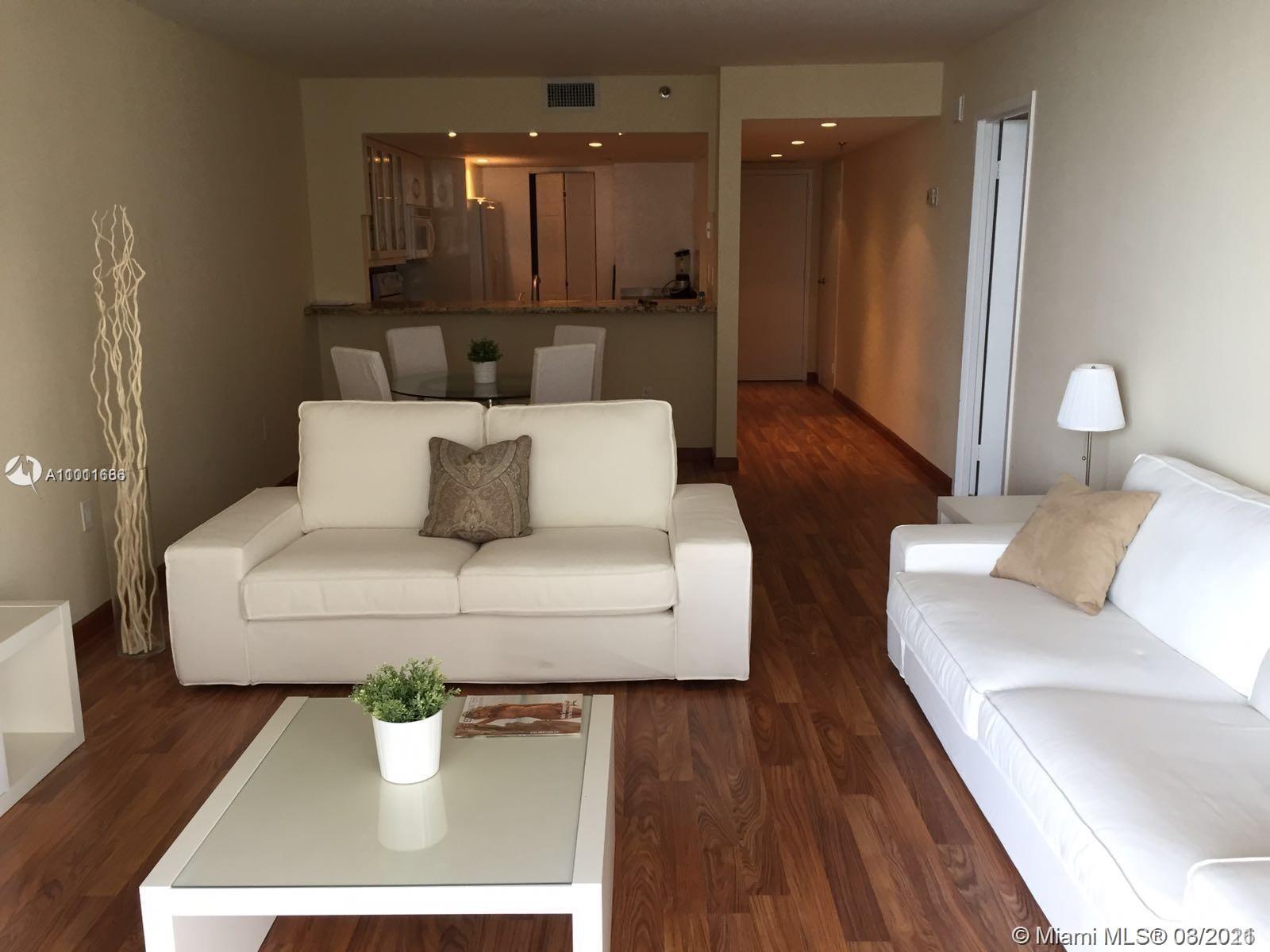 Large 1BR furnished condo with 1 valet parking space. This unit is available fully furnished, it features a beautiful kitchen with granite countertops and white cabinets, wooden floors and carpet in the master suite, large walk-in closet and gorgeous views of Biscayne Bay. Clean and very well maintained building in a premier location within the Miami's Art and Entertainment District, walking distance to museums, theaters, sports and entertainment arenas and much more. No pets. Bar and restaurant by the pool facing Biscayne Bay. Fun and friendly environment.