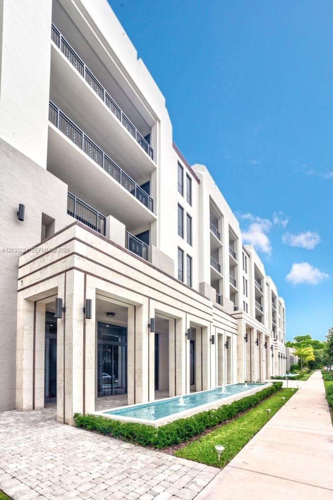 LUXURIOUS TWO-BEDROOM, PLUS LARGE DEN, TWO-AND-A-HALF-BATHROOM CONDOMINIUM LOCATED IN THE HEART OF CORAL GABLES. THIS 2,117 SQ FT UNIT BOASTS AN EXPANSIVE TERRACE PERFECT FOR OUTDOOR ENTERTAINING. IT FEATURES ELEGANT MARBLE FLOORS, A MODERN KITCHEN WITH STAINLESS STEEL APPLIANCES, AND HIGH-END FINISHES THROUGHOUT.