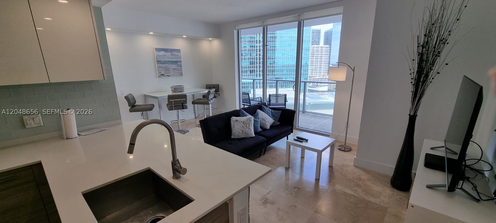 Modern 1 bed/1.5 bath unit on the 17th floor of Brickell House featuring tile flooring, high-impact windows, European kitchen with premium appliances, granite countertops, and walk-in closet in bedroom. Enjoy resort style amenities including two pools, spa, BBQ area, gym, theater and kid's playground. Prime location in the financial district.