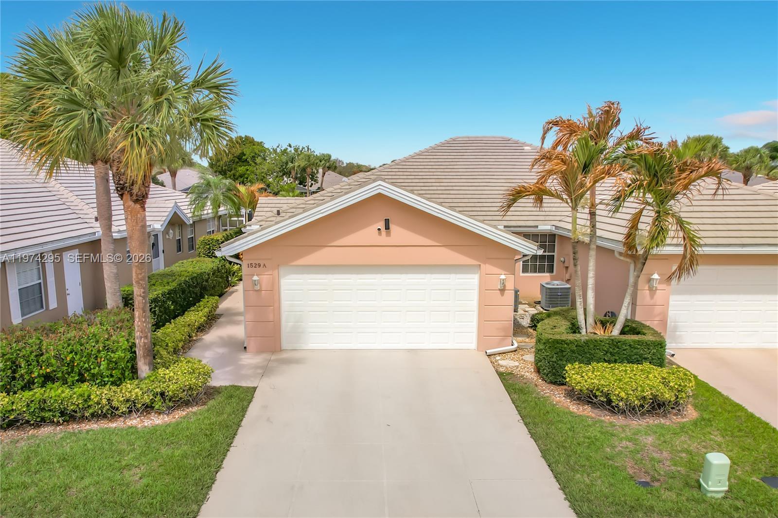 Gorgeous and meticulously kept, turn-key ready home, with breathtaking lake views located in a private and quiet community in the heart of St. Lucie West.

This upgraded DiVosta Extended Capri model features SS appliances, granite countertops throughout, and an extended patio converted into a Florida Room, adding approximately 200 square feet to the living space with custom sun shades. The home includes two dual master suites with custom closet organizers & their own private bathrooms.  It features a floor-to-ceiling media wall with an integrated fireplace, TV, and built-in entertainment center with storage galore as well as plantation shutters throughout. Additional features include an indoor laundry room with a Washer, Dryer, built-in pantry, utility sink, extensive storage and a 2-car Garage.

The property is equipped with accordion shutters, and the roof is maintained by the HOA.   Enjoy your own private tropical oasis with mature hibiscus bushes, palm trees, hawaiian Tis and bromeliads.  Low-maintenance solar path lights enhance evening curb appeal and security along with motion detector lights at the entryway as well as the driveway.

Residents also enjoy close proximity to the community pool, clubhouse, and tennis courts. 

Conveniently located off St. Lucie West Blvd, the home is just minutes away from the NY Mets "spring training stadium", shopping, and dining.