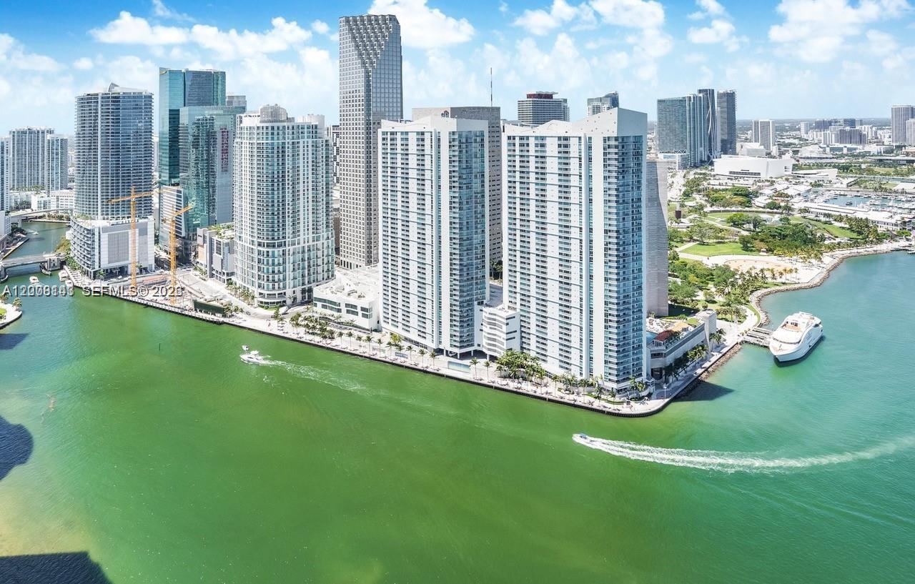 Incredible water views from this tastefully furnished studio in the heart of Downtown Miami. Features built-in closet space surrounding the bed plus additional custom closet. Rent includes basic cable, internet, and water. Full-service building with amenities including 2 swimming pools, jacuzzi, sundeck, 2 party rooms, 2 fitness centers, convenience store, and 24-hour security, valet, and concierge. Includes 1 assigned parking space. Prime location just 2 blocks from Whole Foods Market and 5 blocks from Brickell City Centre. Currently rented for $2,400/month through December 8, 2026. Short-term rentals allowed; can be rented monthly—excellent investment opportunity.