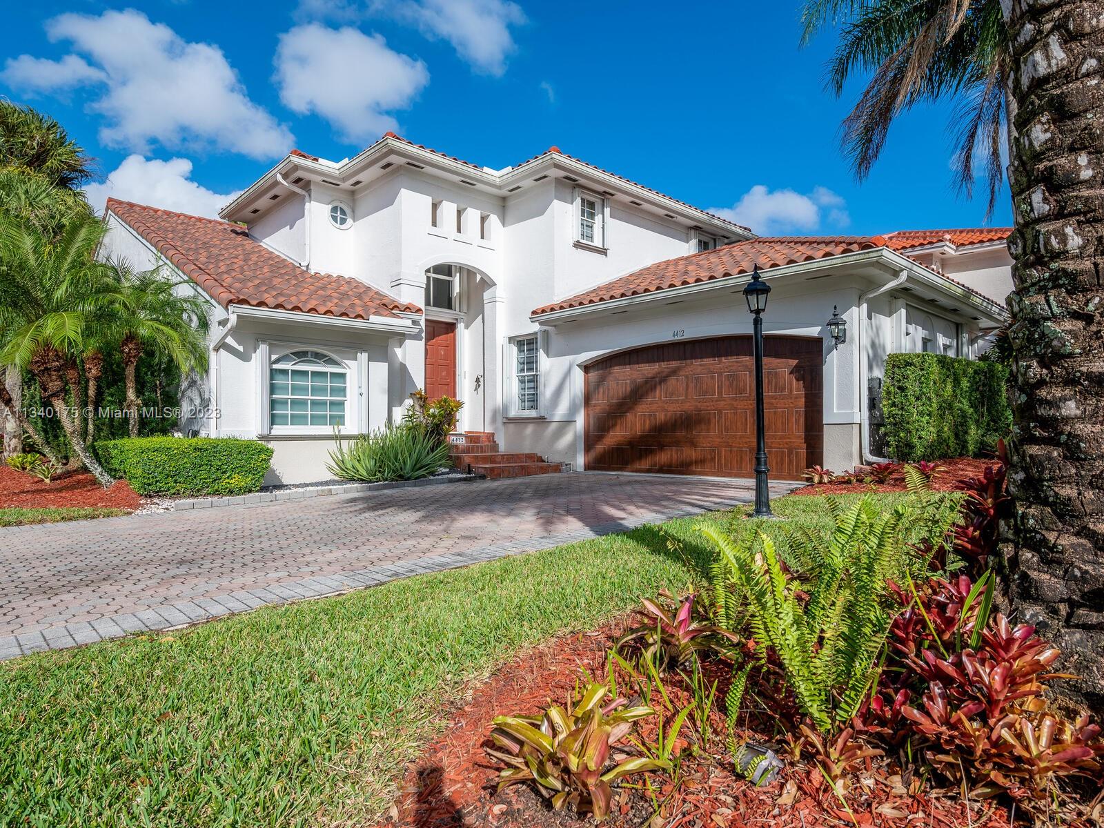 *Doral Estates Villas Fairway Homes*. Two-story home by the famous red golf course. This house features 3 bedrooms one is the master bedroom downstairs and 2.5 bathrooms. Double car garage, marble floors and spacious open concept kitchen with Miele appliances w/ granite counter tops. 
Located on the 15th hole red tiger golf course of the prestigious Doral Golf Resort, the community has swimming pool, guard security to entry and security rover. The house has a lot of upgrades (see attachments) like new roof, new car garage door, new AC units, new electric panel, new water heater, Tesla ports, and more. Come see! Call LA for private appointments.