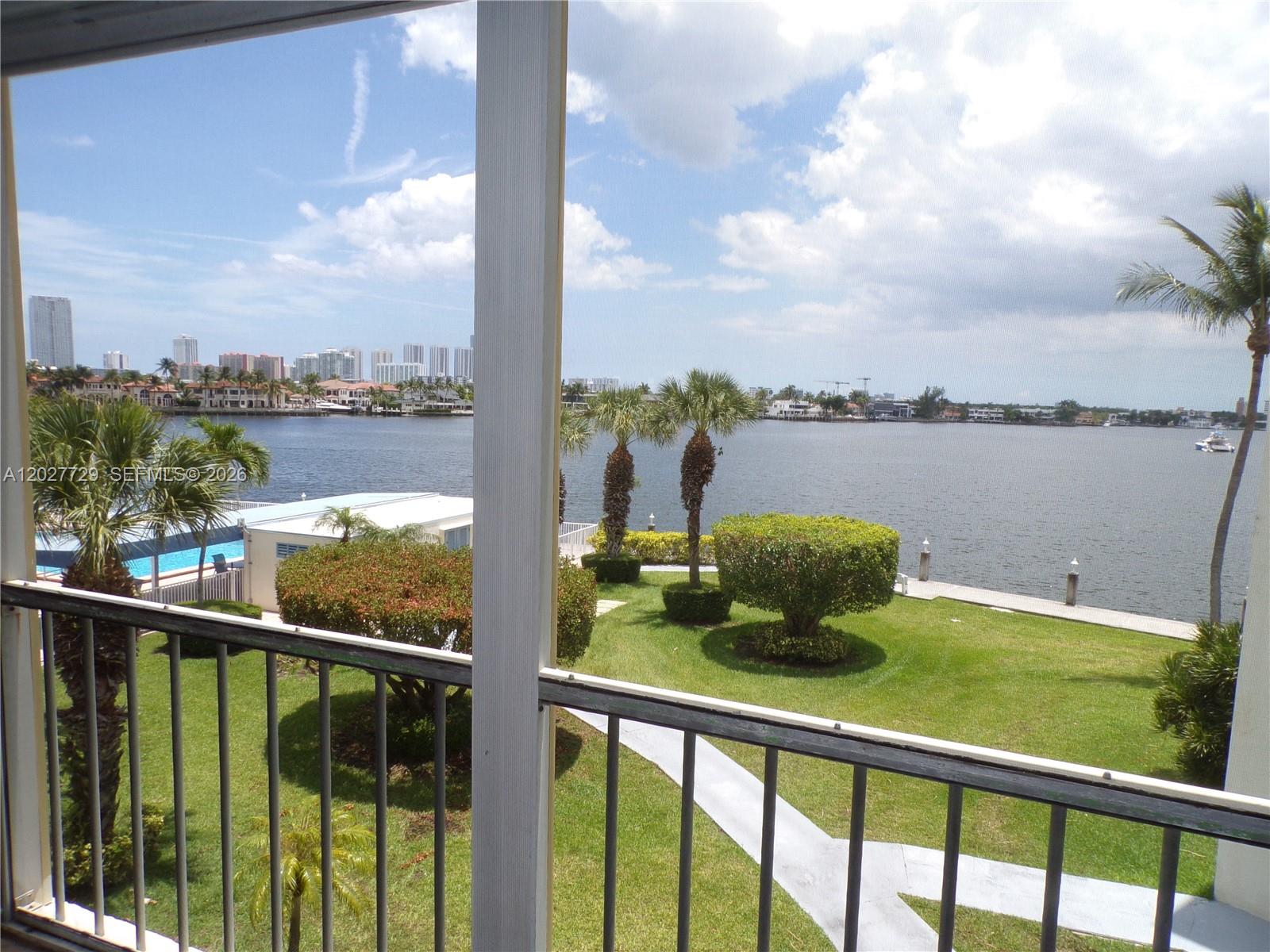 AMAZING WATER VIEW AND POOL AREA VIEW FROM THIS WRAP AROUND BALCONY.  COMPLETELY REMODELED, BEAUTIFUL TILE FLOORS, DREAM KITCHEN WITH BREAKFAST & SNACK AREA BUILT IN, UPGRADED BATHROOMS, MASTER BATH ENLARGED AND UPGRADED BEAUTIFULLY, CLOSET ENLARGED. NEARLY NEW A/C. ACCORDIAN HURRICANE SHUTTERS. NEW HURRICANE PROOF FRONT DOOR & SCREEN DOORS.  FURNITURE NEGOCIABLE--READY TO MOVE IN.   MANY AMMENITIES: CLUBHOUSE, DANCING, GYM, BILLARD, HEATED POOLS. SHOWS, COMMUNITY ROOM, AVENTURA COURTESY BUS, CLOSE TO BEACHES, MALLS, RESTAURANTS, GROCERIES, CASINOS....AND MUCH MORE. THIS IS A 55+ ACTIVE COMMUNITY. SMALL ASSESSMENT OF $28.00 INCLUDED IN THE MONTHLY MAINTENANCE FEES. WIFI AND INTERNET INCLUDED TOO. BRING YOUR BUYER THEY WILL LOVE IT!!