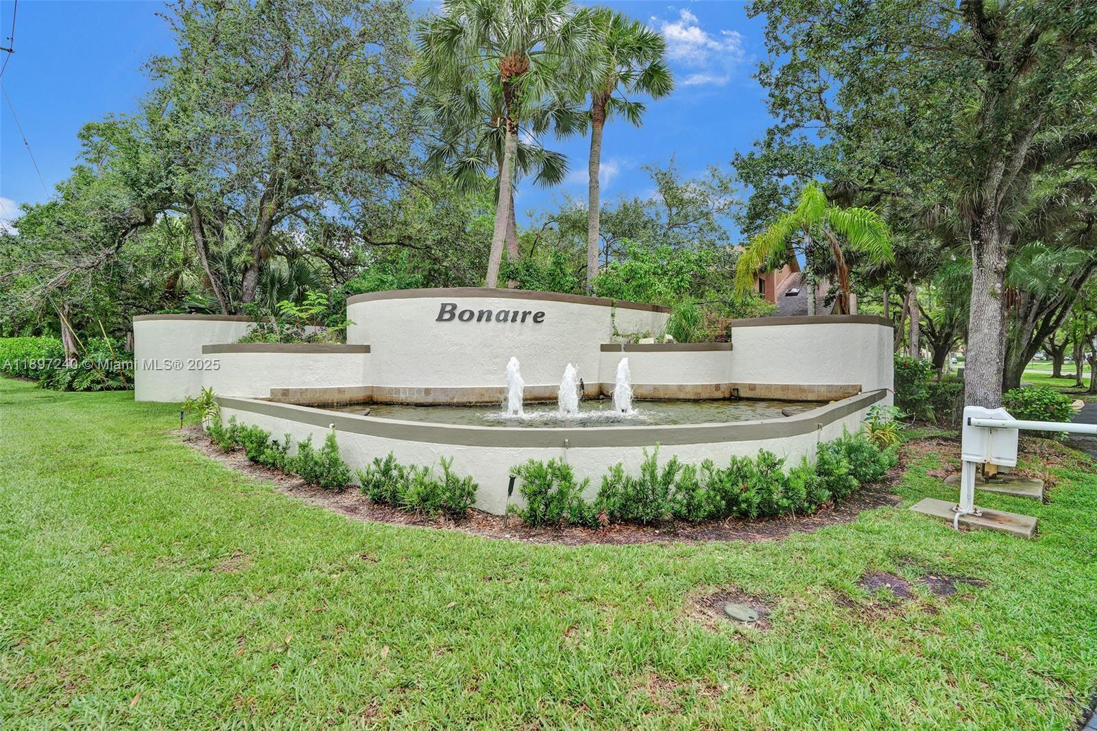 Impressive 3br 3ba townhome nestled in the desirable gated community of Bonaire at Woodmont.  This fabulous home shows off impressive upgrades with exceptional taste.  Cozy remodeled kitchen overlooks the living and dining areas and family room open up to the open deck with garden view.  2nd floor has 2 master suites and one bedroom and full bathroom downstairs.   Bring your fussiest buyers to see this gem.
