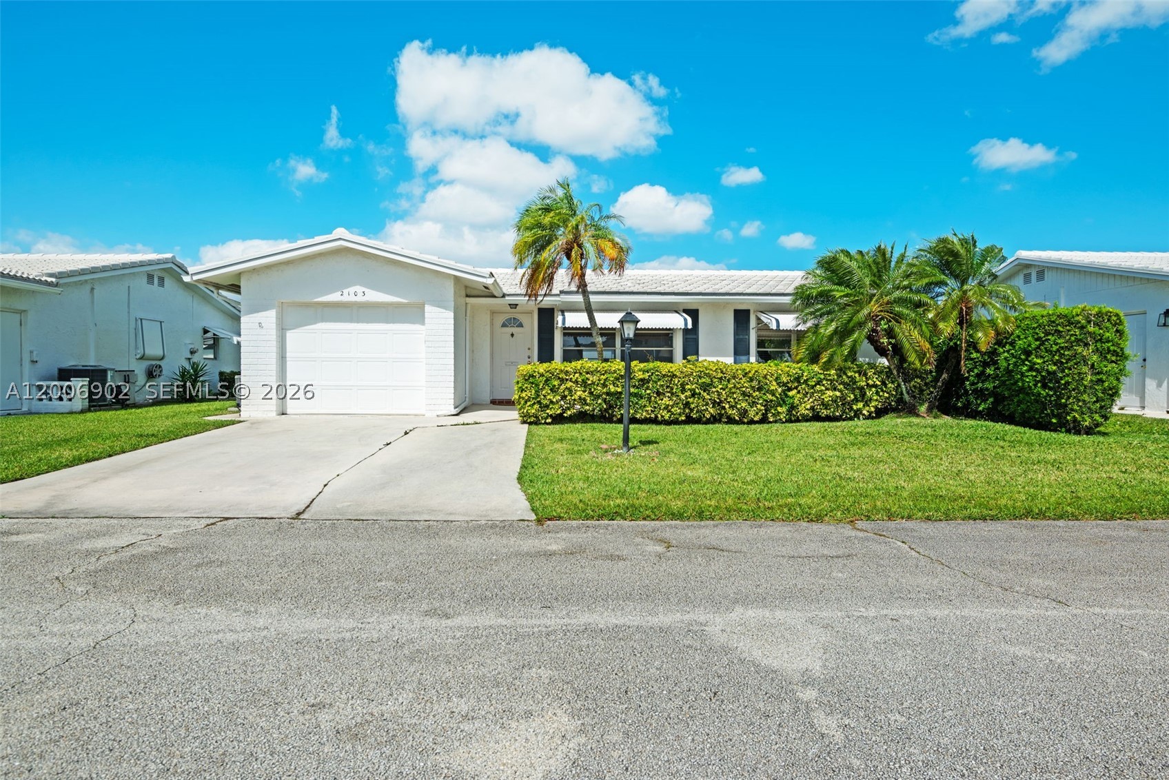 Beautifully maintained 2-bedroom, 2-bathroom home with a 1-car garage, located in the highly desirable 55+ Leisureville community. This move-in-ready residence features newly installed porcelain flooring throughout (2025), a spacious living room perfect for entertaining, and a large Florida room offering additional living space to relax and enjoy year-round. Major updates provide peace of mind, including a new roof (2022), A/C system (2022), water heater (2025), and flat roof (2017). Don't miss this opportunity to own a beautifully updated home in an active and welcoming community.