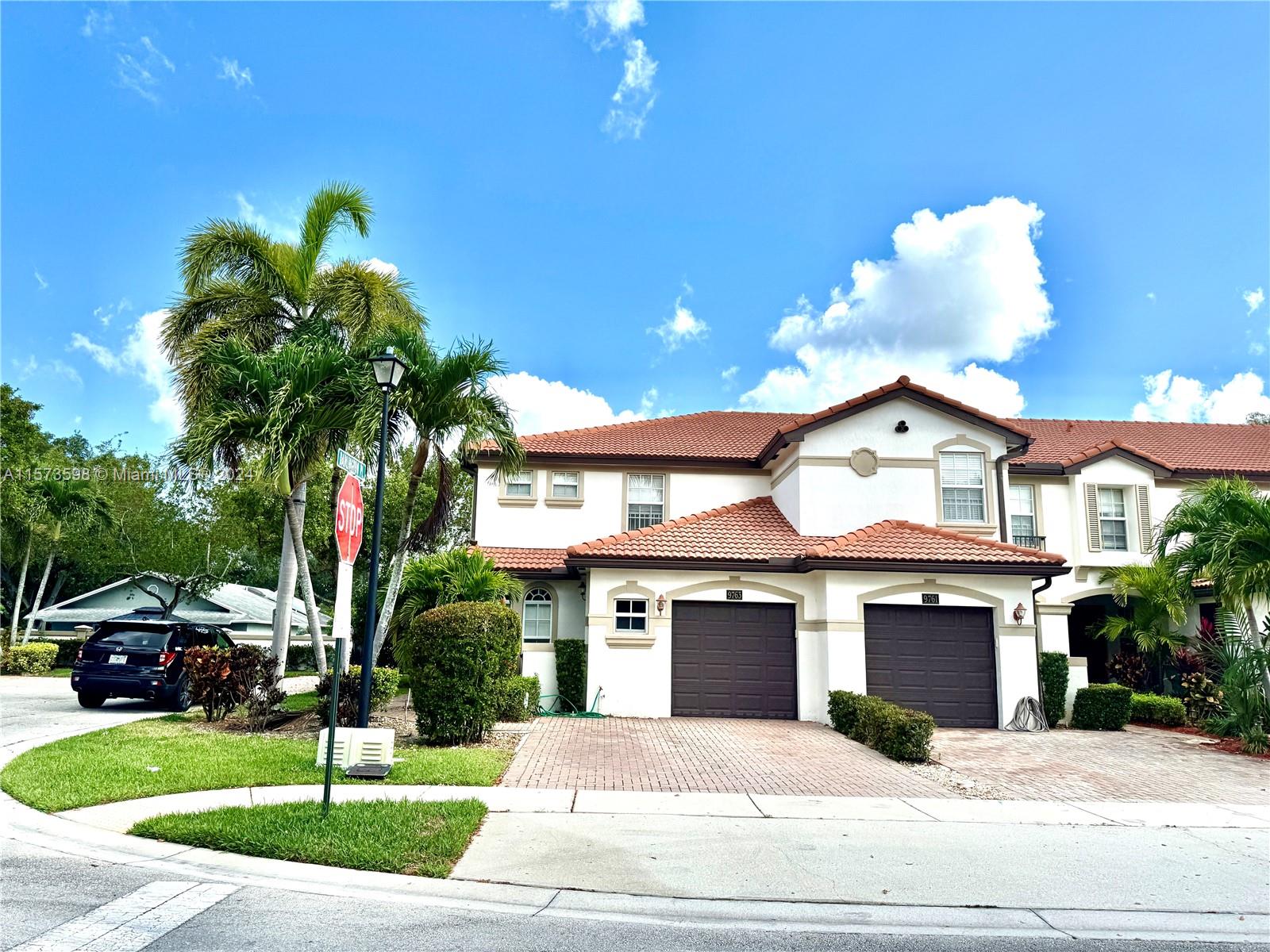 GREAT CORNER LARGE 4 BEDROOM 3 BATHROOM TOWNHOUSE LOCATED IN A GATED COMMUNITY. TILE ON FIRST FLOOR, LAMINATED ON THE SECOND FLOOR, LAUNDRY LOCATED DOWNSTAIRS. STAINLESS STEEL APPLIANCES IN THE KITCHEN. , LARGE MASTER BATHROOM WITH TUB AND SEPARATE SHOWERS,  2 CAR DRIVEWAY WITH ABILITY TO PLACE ONE MORE CAR IN GARAGE AND ONE ON DRIVEWAY SKIRT. LOCATED WITHIN GREAT SCHOOL DISTRICT. CAMERAS ARE PLACED THROUGHOUT THE COMMUNITY FOR EXTRA SECURITY.