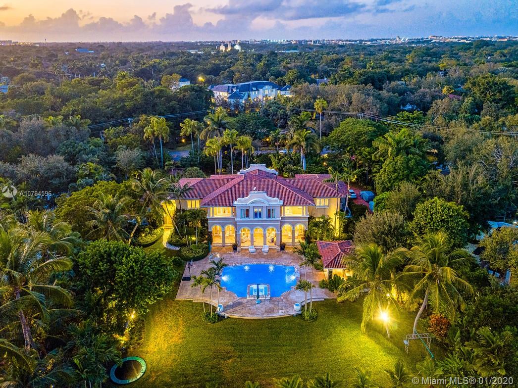 On a 45,738 SF lakefront lot sits a stunning 8909 SF Mediterranean-type home. This special home is located in the sought after, private gated community of Hammock Lakes. With breathtaking views of the tranquil lake as soon as you walk into the foyer. Stunning custom-built house with 6BD/7.5BA, gorgeous pool, summer kitchen, cabana, private dock, children's play area, terrace, 3-car garage. Other amazing finishes include surround sound throughout & Lutron lighting system.

*Chandeliers not included