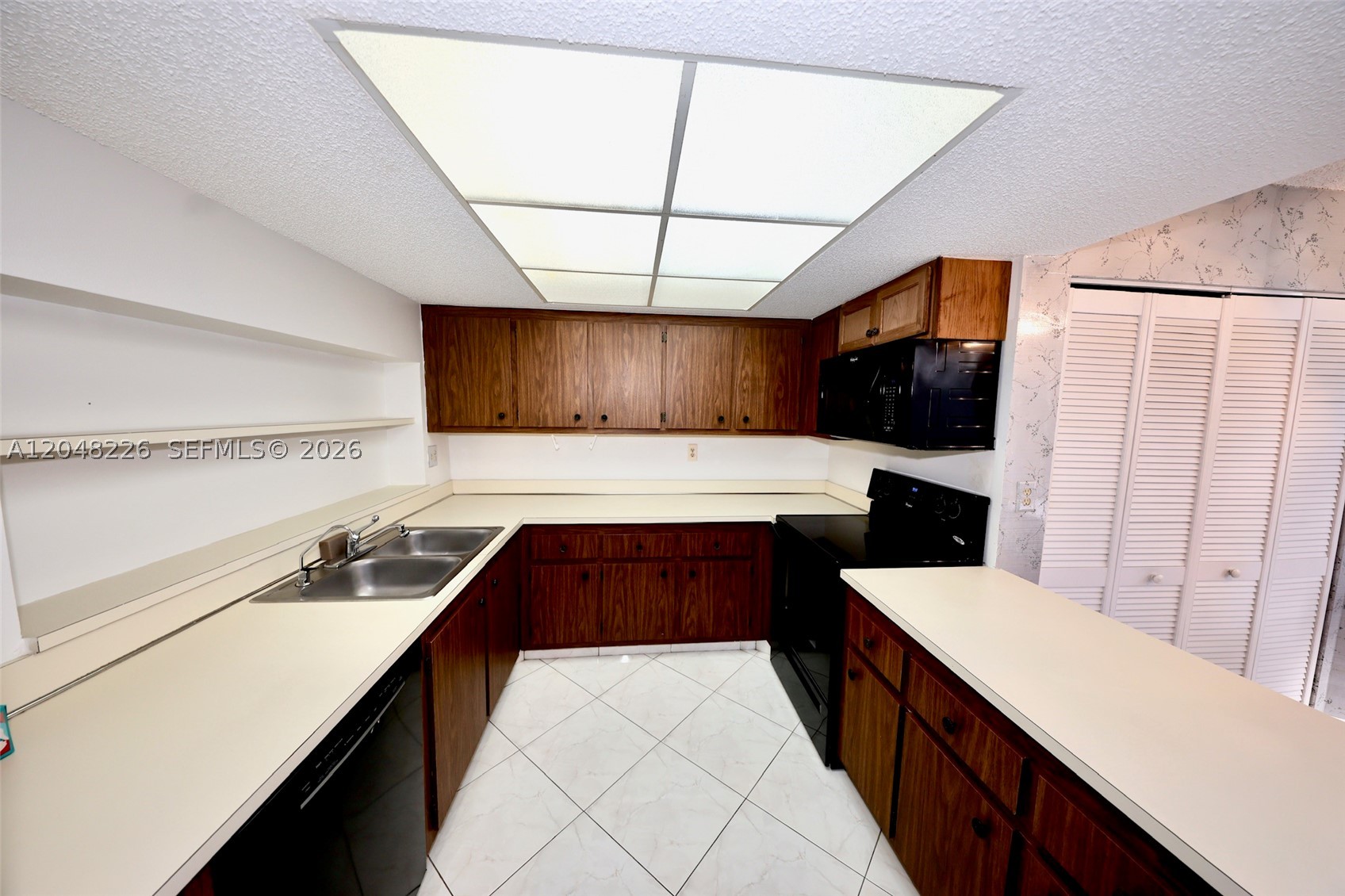 CONDO 2 OF SABAL PALM CON - Residential