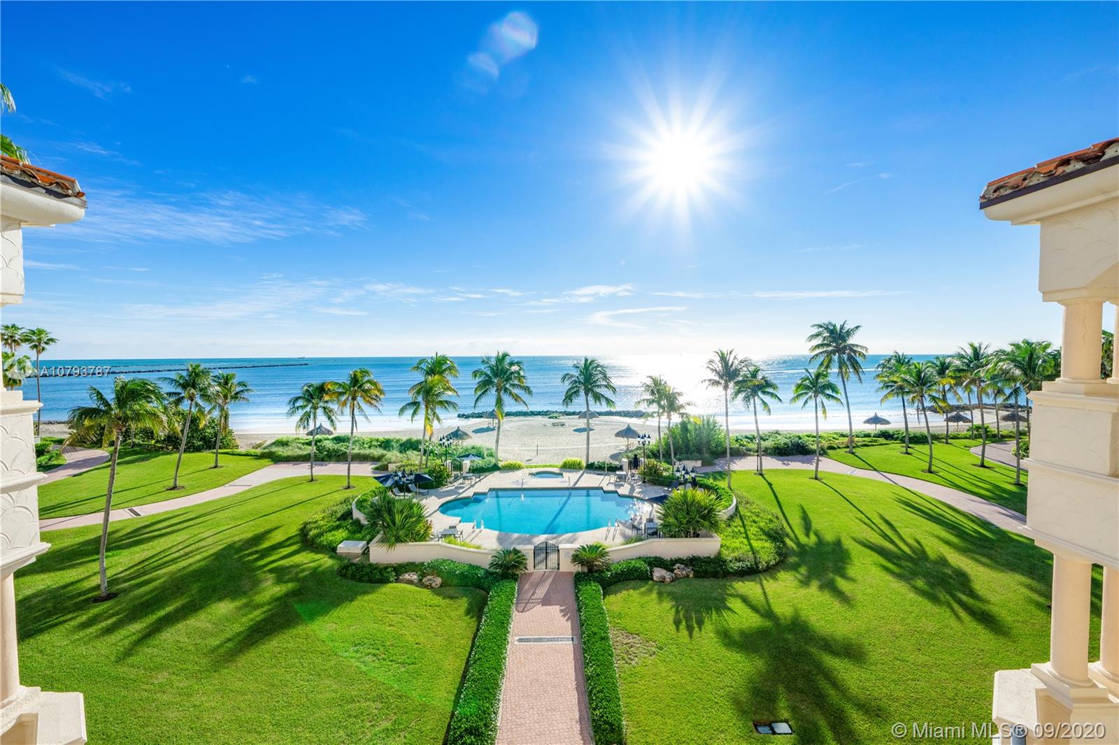 Classically elegant & spacious rarely available "G-1" line featuring the best direct ocean views on Fisher Island. Fabulous 4,590 Sq Ft open floorplan combines living, dining/entertainment areas all seamlessly flowing into 5 terraces merging indoor/outdoor living spaces. Luxurious appointments include; Egyptian Acanthus fireplace, white coral tile & custom rich wood-lined library. Chef's gas kitchen provides top of the line appliances, butler's pantry & breakfast bar. Lavish master suite boasts outdoor jacuzzi on balcony, stunning dual baths, & his/hers walk-in closets. Enjoy world-renowned island amenities; beach club, hotel, spa, gym, golf course, tennis courts, K-8 Fisher Island Day School, 2 marinas, various fine restaurants. Live in one of America's most exclusive & secure zip codes!