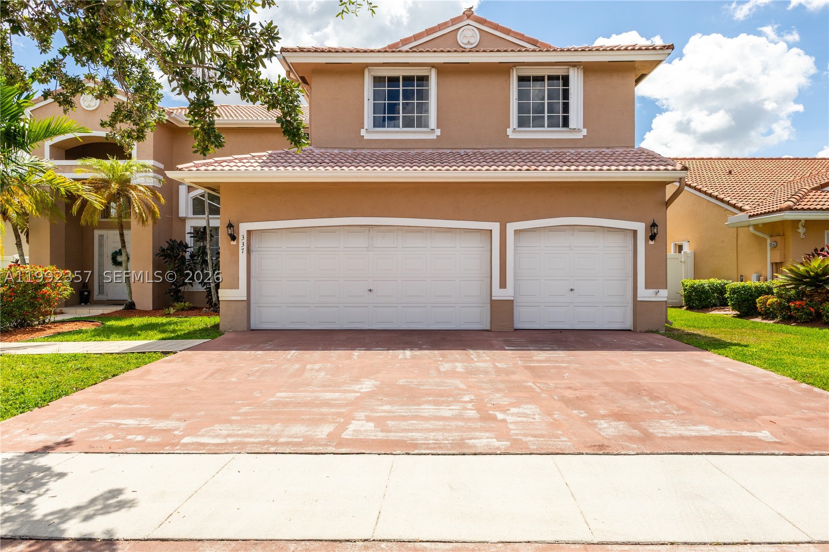 Beautifully maintained Pembroke Pines home featuring a soaring loft-style living room that creates a grand, open and airy feel. Enjoy true Florida living with a private pool, 2021 pool heater, and lush mango trees. Major updates include a 2020 AC and 2016 water heater, with pride of ownership throughout. Unique features like a convenient laundry chute add both charm and functionality. Equipped with accordion shutters and panels for added protection. Kitchen appliances, washer & dryer, pool equipment, security cameras, and garage shelving included. Located in a highly desirable west Pembroke Pines community near top-rated schools, parks, shopping, and dining, with easy access to I-75. Just minutes to Pembroke Gardens and close to major commuter routes - this home truly stands out!
