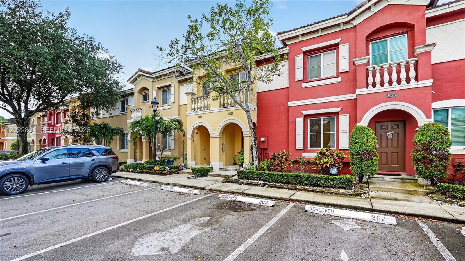 Beautiful 3-bedroom, 2.5-bath townhome located in the desirable gated community of Village Walk. This well-maintained property features new washer and dryer, new range, and new microwave. Enjoy two assigned parking spaces conveniently located right in front of the unit. Community amenities include a pool, children’s play area, gated access, and guard patrol for added security. Centrally located near major highways, shopping, dining, and schools.