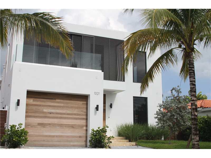 STUNNING MIAMI BEACH RESIDENCE LOCATED IN A GATED COMMUNITY. BEST PRICED NEW CONSTRUCTION BAY FRONT DEEP WATER OCEAN ACCESS HOME ON MIAMI BEACH. MODERN HIGH END DESIGN & EXECUTION BY KOBI KARP ARCHITECTS. WIDE BAY AND INDIAN CREEK ISLE VIEW. DOUBLE HEIGHT  CEILINGS, DESIGNER KITCHEN & BATHS. OPEN FLOORPLAN. POOL/SPA. NEW DOCK 15'X40' +/- WITH UTILITIES.  600+ SQFT ROOFTOP TERRACE WITH PANORAMIC VIEWS FROM DOWNTOWN TO AVENTURA ACCESSIBLE BY THREE TIER FLOATING MAIN STAIRCASE. 4 BED/BATH & MAIDS.