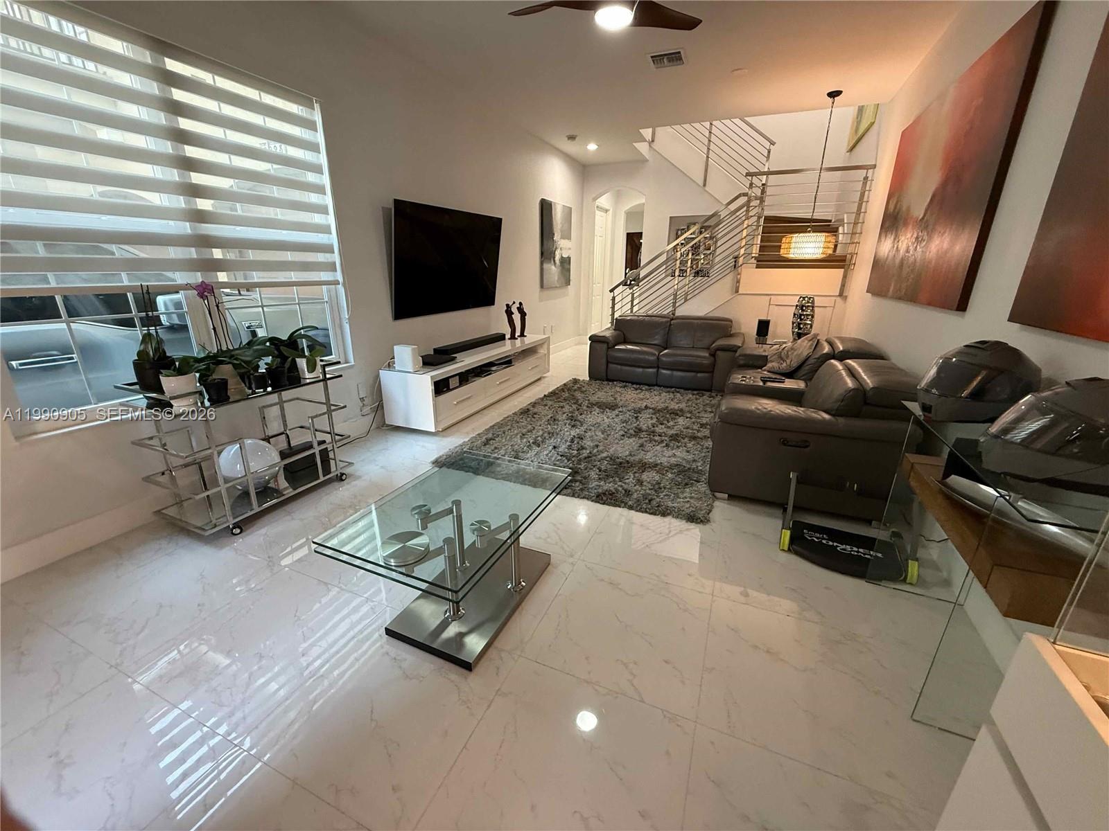 Welcome to your new home in beautiful Coconut Creek! This spacious 3-bedroom, 2.5-bathroom townhome offers a perfect blend of comfort and style. fully upgraded this property is a must-see. Newly renovated kitchen with top of-the-line appliances, modern cabinetry, and granite countertops, perfect for the home chef. Three generous bedrooms, two bathrooms, plus a convenient half bath for guests. Enjoy peace of mind with impact windows, and built-in closets, offering ample storage and a touch of elegance. Situated in a well-maintained community access to amenities and close proximity to parks, shopping, and dining. This town home is ready for you to move in and start enjoying all that Coconut Creek has to offer. New AC, New Water heater, new 2nd floor flooring and new appliances.