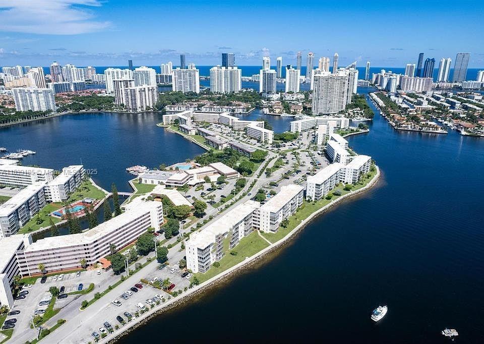 Conveniently located near Aventura Mall, Biscayne Blvd, and the Intracoastal, in a gated 55+ cmmunity. This spacious 1BR/1BA condo is centrally positioned on the 3rd floor of the North Building. Enjoy serene water views from your private screened balcony in a peaceful environment. Amenities include gated security, internet, cable TV, and access to an impressive suite of amenities. Newly renovated with modern clean style.