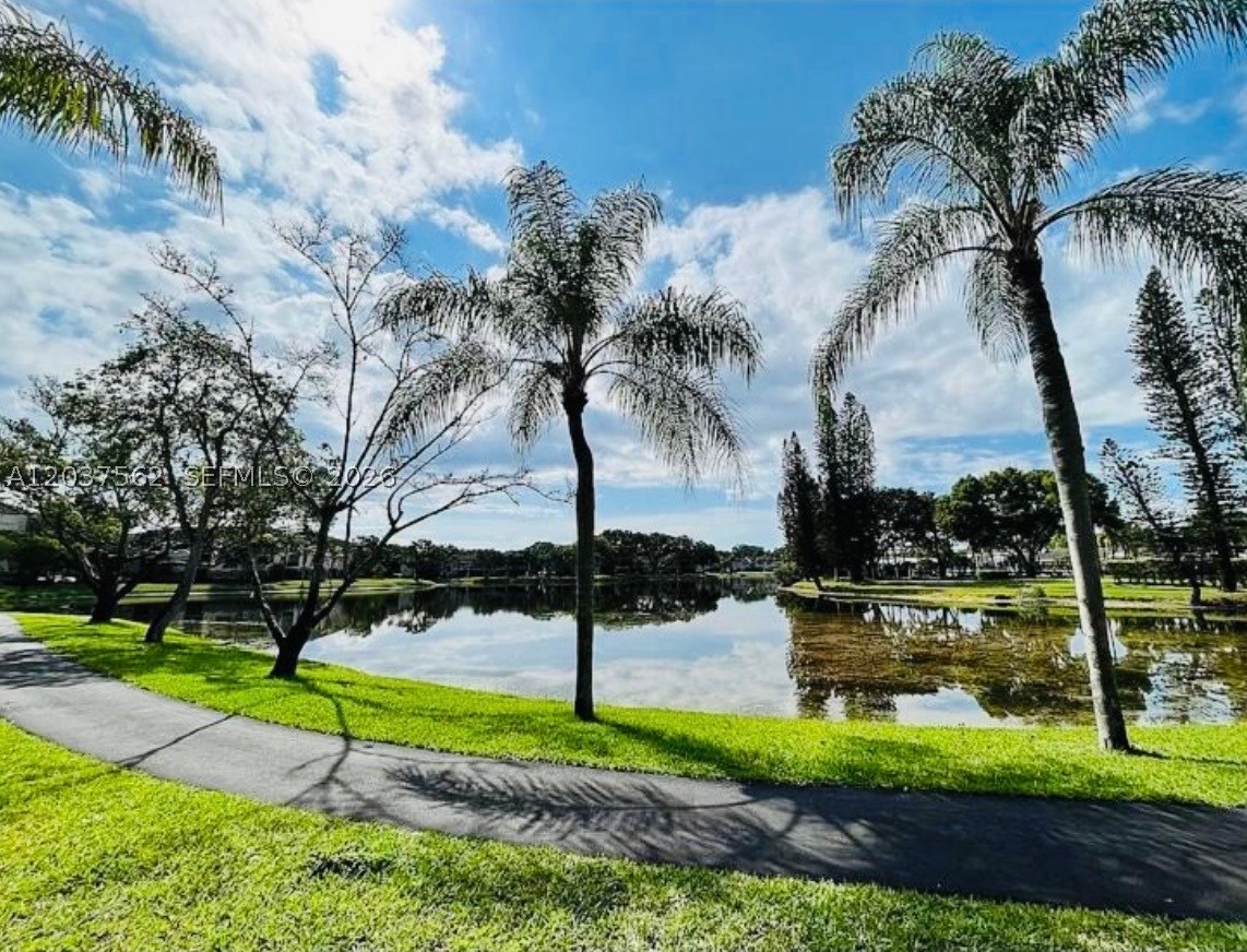 Well-maintained top-floor condo in Bayport Village at the Township, Coconut Creek! The open layout offers a split floor plan with the primary suite featuring a walk-in closet and huge bath. Bright and open dining and living area with a beautiful lakeview. Washer and Dryer are inside the unit. Conveniently located near a shopping plaza, movie theater, casino, and many well-known restaurants. Easy access to the Turnpike, Sawgrass Expressway, and I-95.