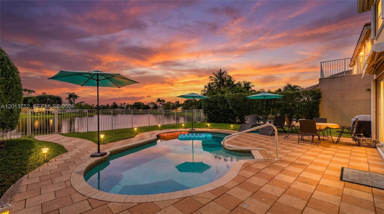 Discover this sunset-facing waterfront pool home located in Emerald Estates at Ruby Cove, one of Weston's most desirable communities. This two-story residence offers a spacious floor plan, abundant natural light, and beautiful lake views that create an inviting setting for everyday living and entertaining. A private bedroom and full bathroom on first floor away from the kitchen, with lake views! Perfect for you know who ;-)  

Stay cool all summer with a 2021 air conditioner!

Enjoy South Florida outdoor living from your private backyard featuring a pool, patio area, amazing sunset views and tranquil waterfront backdrop. The interior offers generous living spaces with a seamless connection between indoor and outdoor areas.

Whether you're ready to move in or customize the home to fit your personal style, this home is the perfect fit and passed a full inspection recently with no issues. 

Emerald Estates is known for its beautifully maintained surroundings, tree-lined streets, and convenient location. Residents enjoy access to highly rated schools, parks, walking and biking trails, golf courses, shopping, dining, and major commuter routes while maintaining the peaceful character that has made Weston one of South Florida's most sought-after cities.

Experience the combination of waterfront living, a private pool, & the exceptional lifestyle that Weston has to offer.