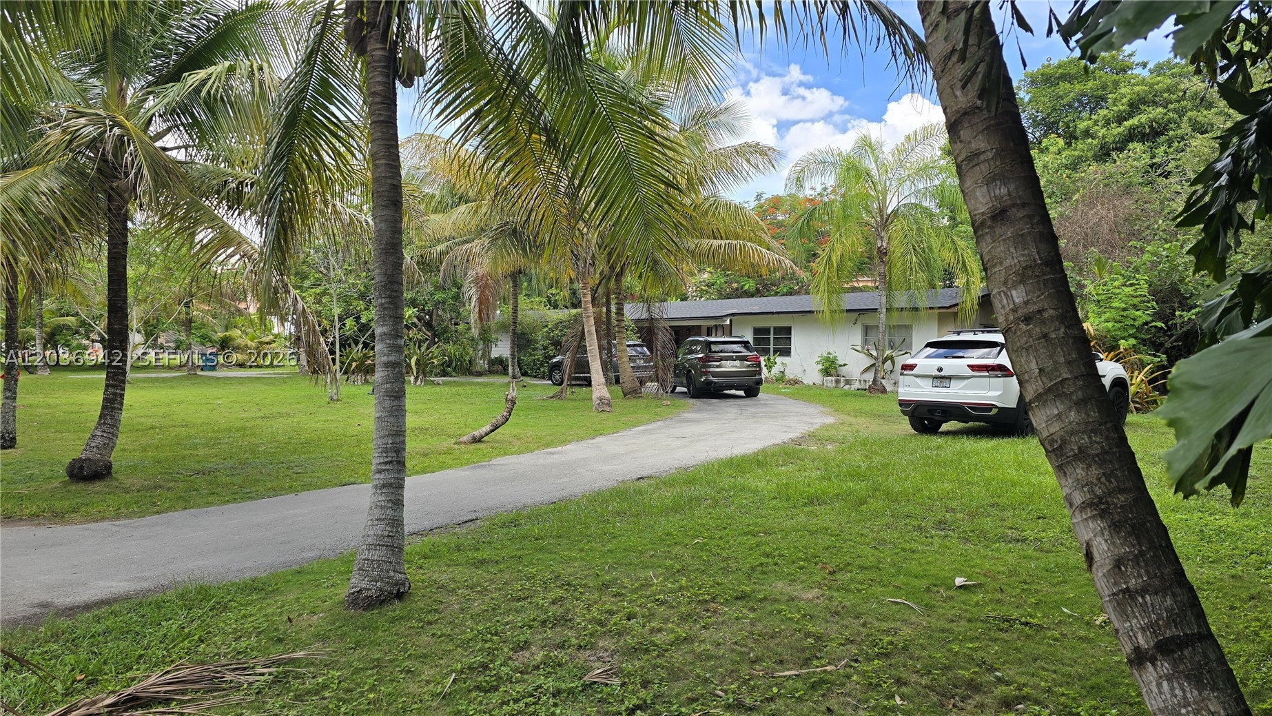 EXCEPTIONAL OPPORTUNITY ON A CORNER LOT NEARLY ONE ACRE IN SIZE! This spacious4- bedroom, 3-bathroom home features a desirable in-law quarters ,a 1-year old roof, and a private pool, all situated on a almost one-acre lot surrounded by multi-million-dollar estates. this property presents a rare opportunity to renovate, customize, or invest in one of the area's most desirable neighborhoods. The oversized lot provides ample room for expansion, outdoor entertaining, or creating your own private oasis.Whether you're looking to transform this home into a luxury residence or capitalize on its premier location and generous lot size, this is a property with endless possibilities.  MOTIVATED SELLER-DON'T MISS THIS UNIQUE OPPORTUNITY IN A PRIME LOCATION!!