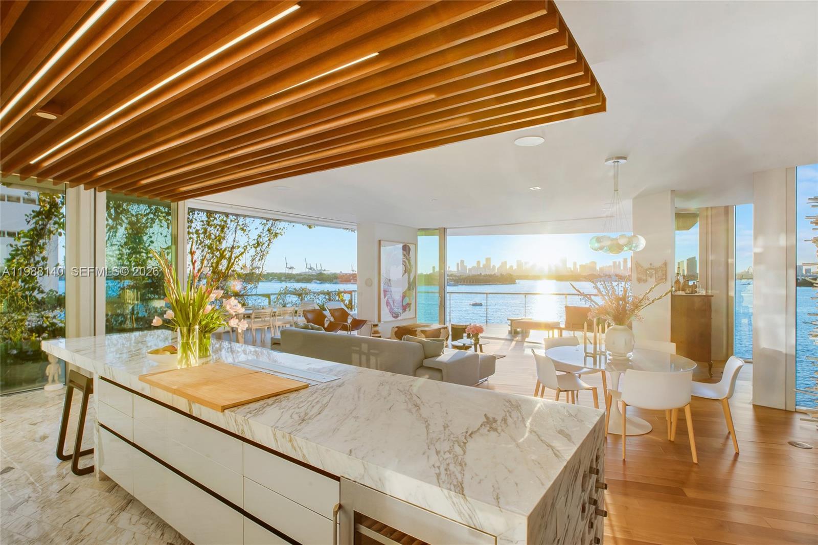 Experience the most breathtaking sunset views over Biscayne Bay from the highly coveted "F-line"—the most premium residence in the building. Designed by Pritzker Prize-winning architect Jean Nouvel, this ultra-luxurious boutique building offers an exclusive lifestyle with only 59 residences. This spectacular 3-bedroom, 3.5-bathroom home features 2,374 square feet of light-filled interiors seamlessly integrated with an expansive 2,242-square-foot terrace, totaling over 4,500+ square feet of living space. Complete with exclusive marble baths, custom closets, and automated shades, this residence represents the absolute best of South Beach waterfront living. Available from 4/1/26 to 11/30/2026.