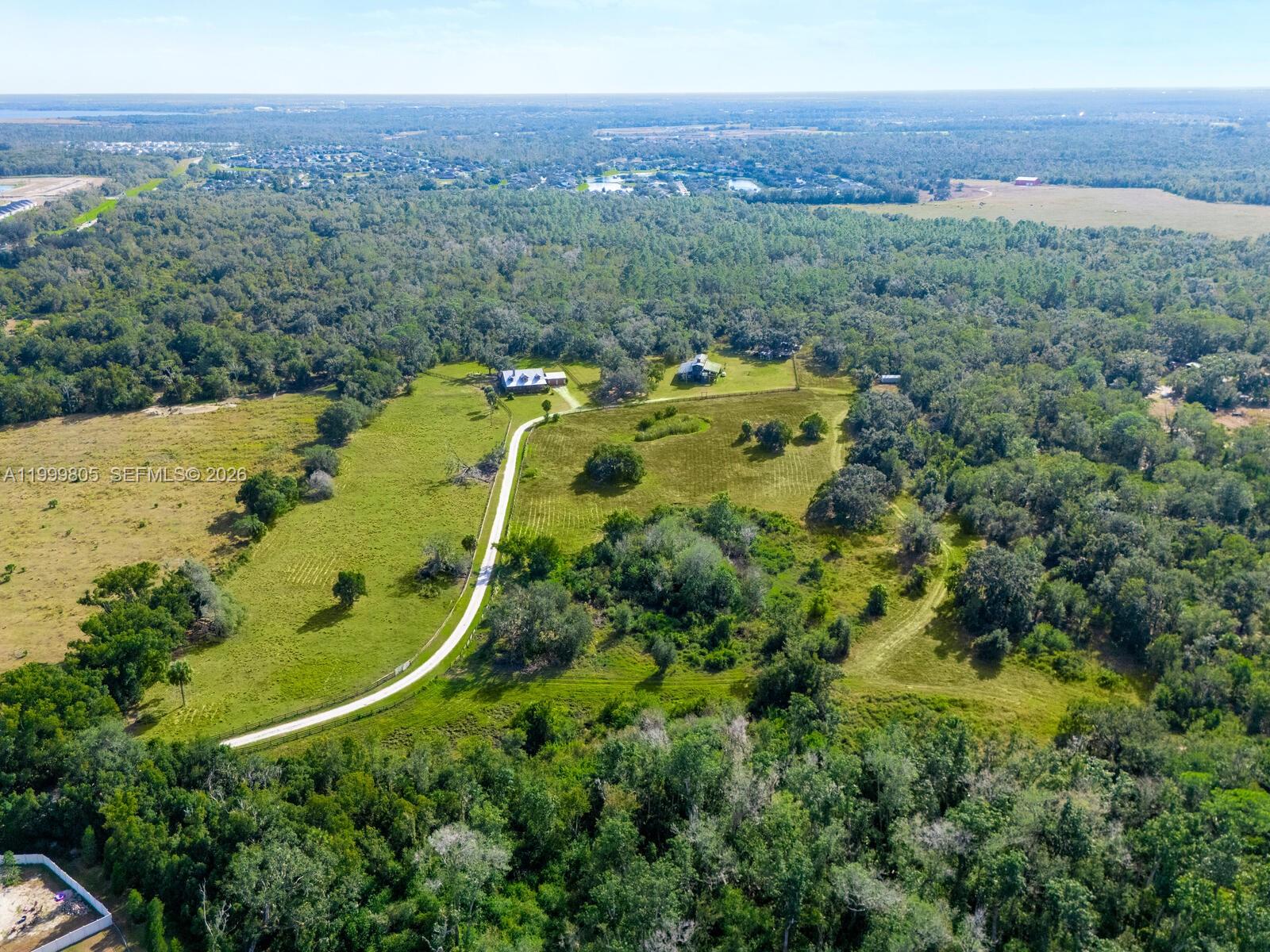 Rarely does an opportunity of this magnitude emerge: a 40-acre contiguous parcel in the path of Southwest Florida's most aggressive growth corridor. Located on Rye Road in Parrish, this property sits at the epicenter of catalytic infrastructure, including road widening, a new hospital, a State College campus, and the Parrish Area Improvement District (TIF). As the spine of Manatee County’s expansion, the Rye Road corridor supports the 103,000 units approved countywide, with 45,000 designated for East County alone.

This site is ideal for residential subdivision, mixed-use, agritourism, or a premier equestrian estate. It is a prime candidate for strategic land banking during this buildout. The parcel features a 2,182 SF custom residence (2014) with a saltwater lap pool and pole barn, providing immediate utility during rezoning. With A/General Agriculture zoning, the land offers a clean slate for planned development, aligning with neighboring high-density projects.

Enjoy seamless access to major arteries, UTC Mall, top-tier schools, and Gulf beaches. With the upcoming four-lane improvements to Rye Road and the extension of Mulholland Road, connectivity is unmatched. An INVESTOR'S DREAM in Florida’s fastest-growing submarket.