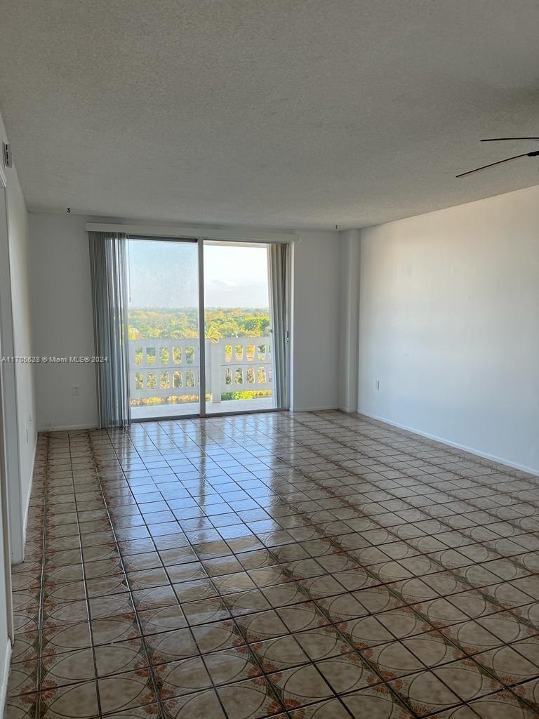 Discover this centrally located unit, offering easy access to major highways—ideal for attracting quality tenants. Currently rented, this property features an updated bathroom and a spacious kitchen, enhancing its rental appeal. Two closets in the bedroom provide ample storage, while the private balcony with shutters adds a touch of charm. With tile flooring throughout for low maintenance, this unit is a fantastic investment opportunity with immediate rental income!