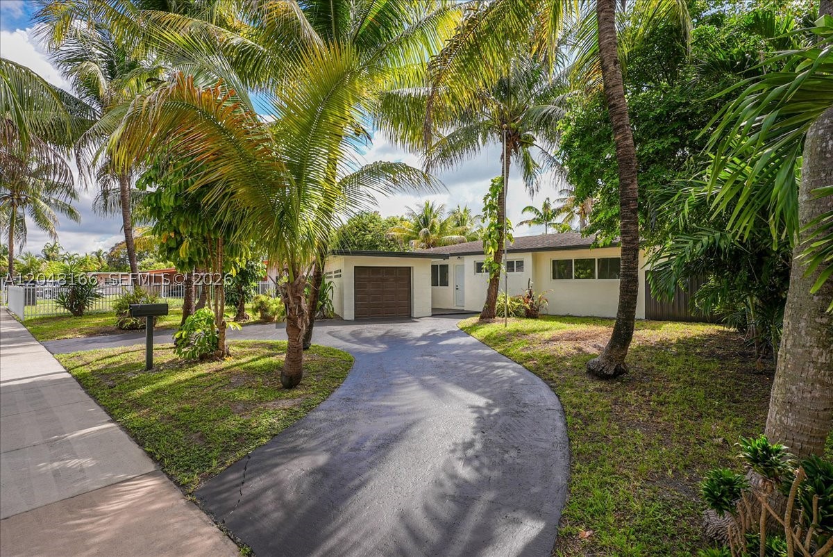 Beautifully remodeled home featuring a spacious fenced backyard, a garage, and modern finishes throughout. Conveniently located just minutes from the beach with easy access to all major highways, shopping, dining, and entertainment. A perfect move-in-ready home