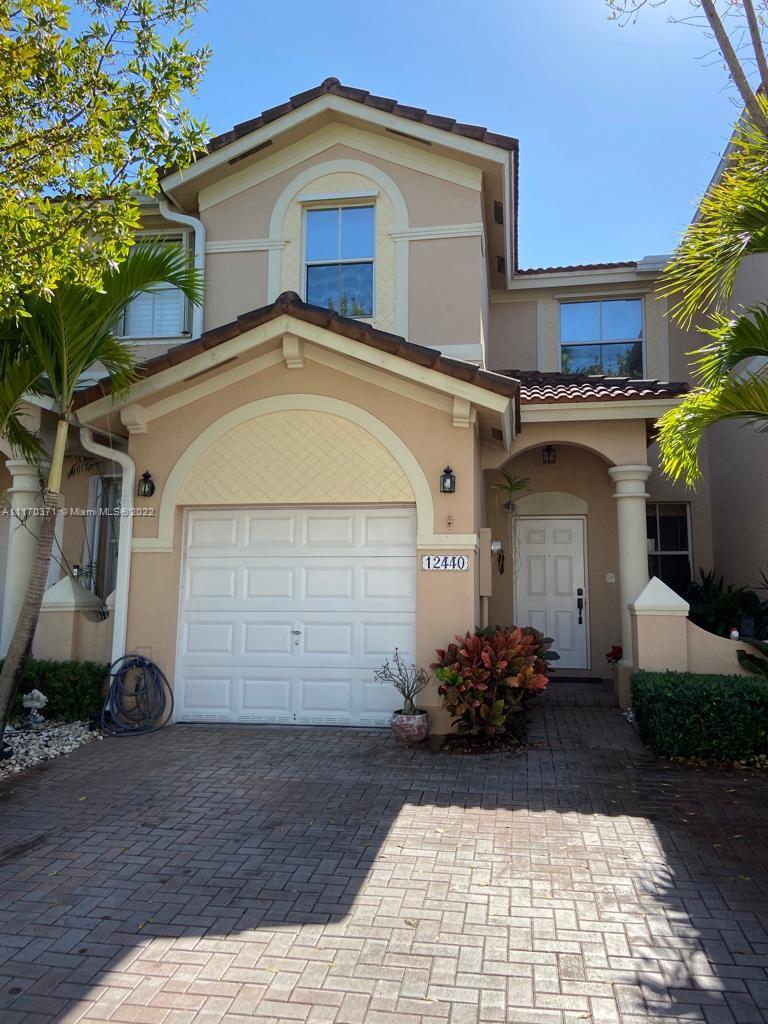 Beautiful 3B/2.5b Townhome in desirable Kendall Breeze Community. Spacious Master Bedroom with high ceilings, walk-in closet & jacuzzi. Nice dining and living room, plus family room and patio with brick pavers. Very secure with monitoring in-home security system. Community has 3 pools, 2 playgrounds, gym fully equipped, clubhouse & 24 hours security patrol. Easy access to Florida Turnpike & Palmetto Expressway. Great shopping malls and restaurants nearby. This TH will go fast!. Call or text listing agent for showings.