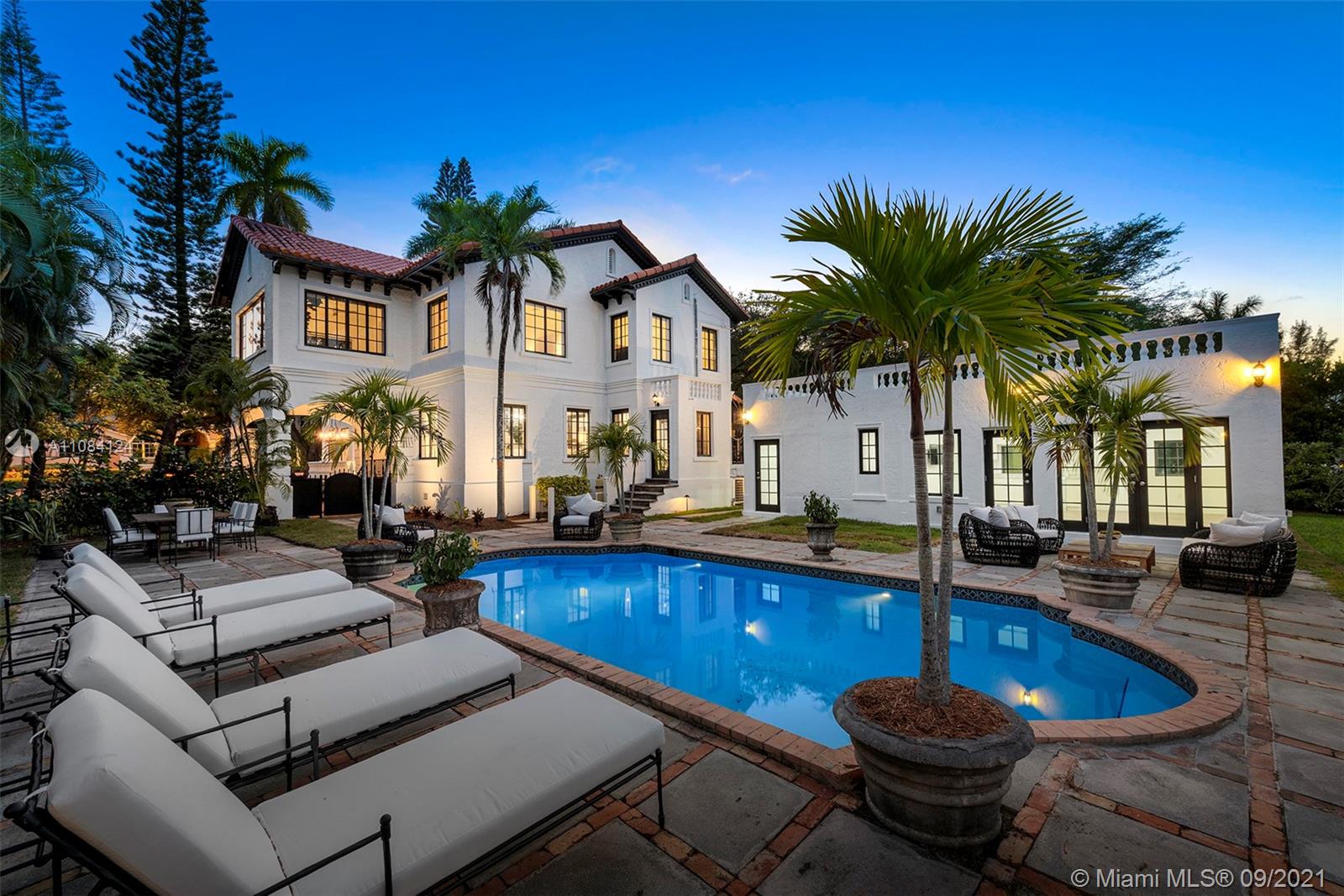 Meticulously updated Historic Masterpiece from 1928, situated on 15,000 sqft of land with +/- 100 lft on the inlet of the Coral Gables Waterway, no bridges to bay. The 2-story home is an excellent example of Mediterranean Revival architecture. Roof with clay barrel tiles, detailed with roof outrigger beams and finished in rough stucco. Our Grand Dame has a well appointed and light filled living room with fireplace, dining room, kitchen, sunroom/enclosed porch/café, half bath and porte-cochere on the 1st Floor. 2nd Floor offers 4BR/2BA, and a south facing balcony from the Master Suite. Preserved and refinished oak floors and original clay tiles. A secluded 1BR/1BA cottage is overlooking the waterway, patio and the beautiful pool. A truly magical home!
Showings starts Saturday, Sept 18.