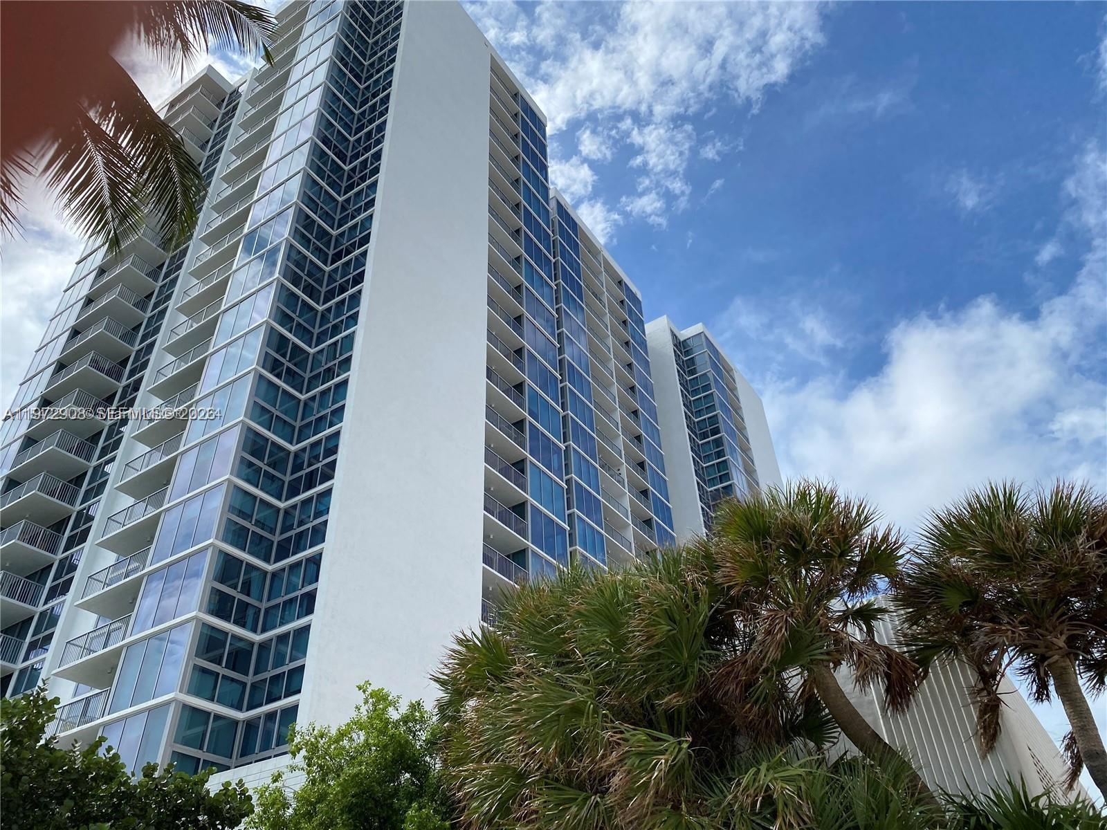 * * *  Miami Beach lifestyle at the oceanfront Mirasol Ocean Towers!  This spacious 1 bed, plus den (possible second bed or office/studio) - with 1 1/2 bath unit offer 1,190 sq. ft. / Model B - facing South with nice Ocean and Bayview from this high floor.  Lot's light-filled interiors, lot's closet space, impact windows floor to ceiling, and sweeping ocean, bay, and pool views. Enjoy resort-style amenities including a heated pool and spacious deck, fitness center with several new machines!, sauna, bicycle storage, library/business center room and 24-hour front desk — all steps from the sand and minutes to South Beach, Ocean Drive, Lincoln Road and rejuvenate North Beach! Right behind the new Pedestrian walk-way from South to North Beach! - sporting recently upgraded gym with Peloton and Life Fitness equipment. The neighbors within walking distance are the top Hotels/Venue of the Edition, The One, The W, Faena and the Faena Cultural District. - Public transportation and the free Miami Beach Trolley - Several Restaurants, Cafes and Supermarket downstairs next to the building, including the new MOTEK restaurant! - Operating budget with reserve funding. Maintenance including Basic Cable TV, WIFI and pest control - Per association, dogs allowed if emotional or service dog documents.  Owner Financing$$$  -  One assigned parking space, visitors parking and street/parking lot right across street corner in Collins Ave.