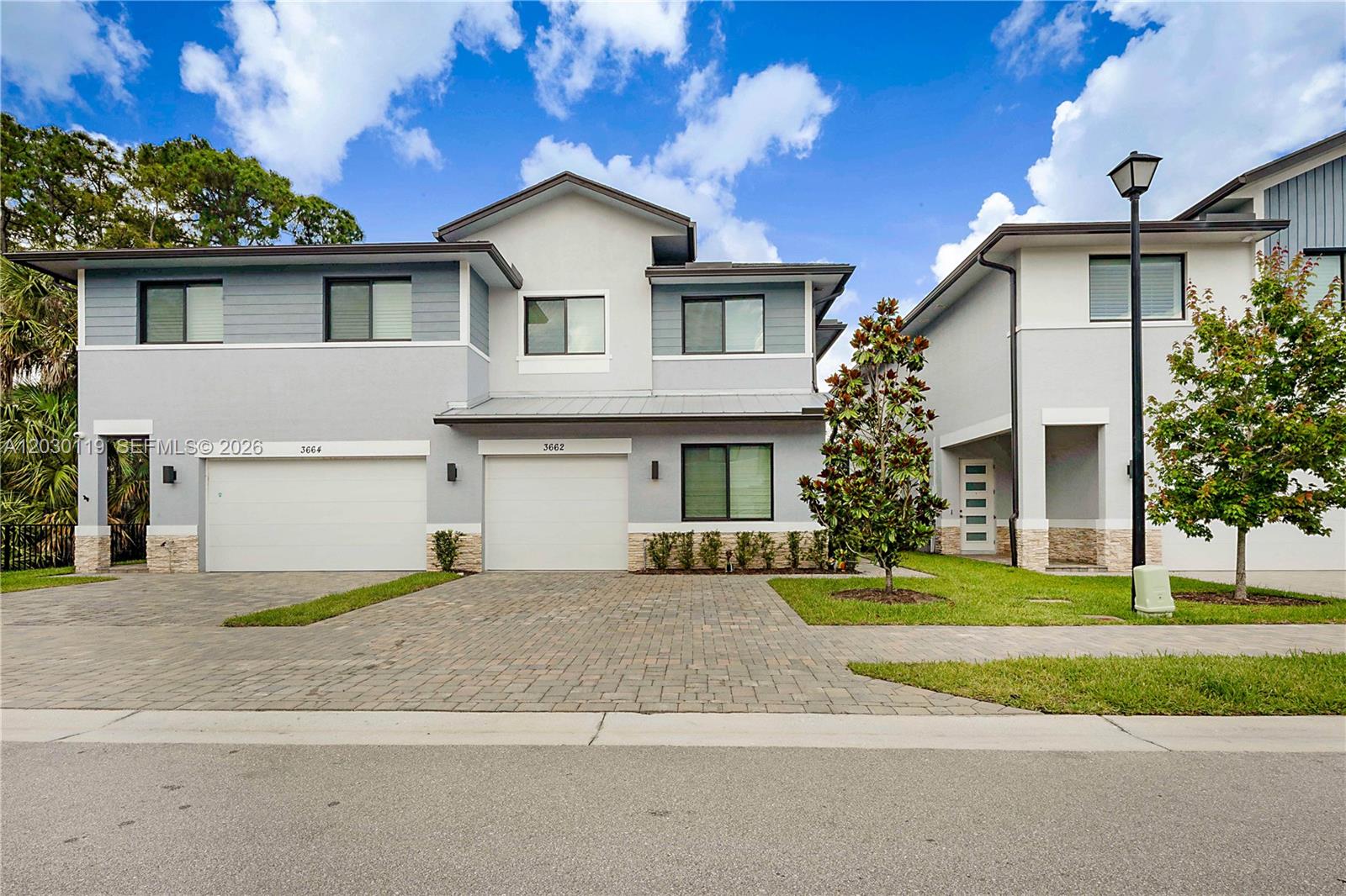 Built in 2024, this stunning lakefront home offers the perfect combination of modern luxury, privacy and peace of mind. Situated on a premium homesite next to a preserve and set back from the street, you'll enjoy beautiful lake views and a tranquil setting rarely found in today's market. The versatile floor plan features 4 bedrooms and 3 full baths, including a desirable first-floor bedroom and full bath—ideal for guests, multigenerational living or a home office. The open-concept design includes a spacious kitchen with quartz counters, large island, pantry, dining area, tile flooring, laundry room, one-car garage and covered lanai overlooking the lake. Built with reinforced construction materials and 3,000 PSI concrete, this HERS® (RESNET) certified home offers energy-efficient glass, advanced air filtration and ventilation, high-performance HVAC, and energy-saving features designed for comfort, durability, and lower utility costs.Whether you're seeking a full-time residence, seasonal getaway, or investment opportunity, rentals are permitted immediately with a six-month minimum lease. Residents also enjoy access to the community pool, perfect for relaxing and enjoying Florida's year-round sunshine.Located just minutes from downtown Stuart, beautiful beaches, waterfront dining, shopping, and entertainment. Enjoy the advantages of newer construction, potential insurance & energy savings, lower Martin County taxes and the carefree South Florida lifestyle you've been dreaming of