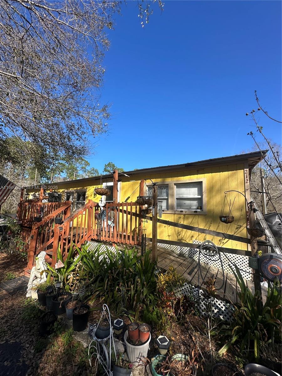 Spacious Property on 2.28 Acres with Solar Panels – Great Potential Double wide mobile home (2010) located on 2.28 acres of agricultural-zoned land, offering space, privacy, and endless possibilities. The home features 2 bedrooms, 2 bathrooms, plus an additional room ideal for a home office, guest room, or flexible living space. The property offers tile flooring throughout and sits on a paved road, providing easy access. With a little care and maintenance, this home has the potential to truly shine — making it a great opportunity for buyers looking to create value and customize a property to their needs. Solar panels are included and can be paid off at closing using the proceeds from the sale, offering long-term energy savings. Ideal for first-time homebuyers, buyers seeking space for a home-based business, or anyone looking to enjoy acreage with room to grow.
