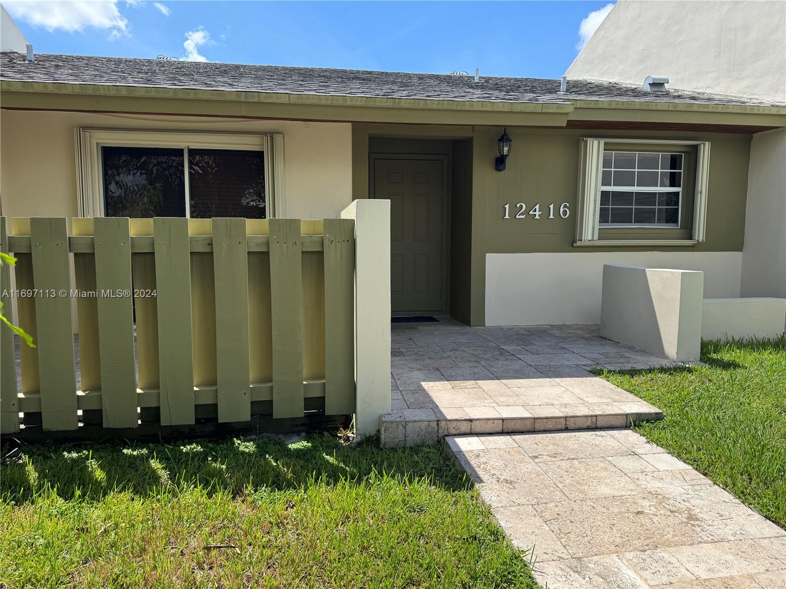 Rent TODAY! Remodeled bathrooms, with tile floors throughout, brand new refrigerator. Includes a bonus room which could be considered as a 3rd bedroom. Parking has also been extended to fit 3 vehicles. Vault ceilings, spacious master bedroom and living room. Washer and Dryer in patio within a private space. Located 5 mins to Turnpike and SR-84 to the Palmetto Expressway.