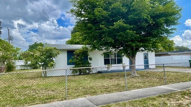 BEAUTIFUL HOUSE RESENTLY UPDATED, 3 BEDROOM ONE BATHROOM ( extra bathroom can be added easily if needed since its big enough ). remodeled kitchen with wood cabinets and WOOD TOPS, LAUNDRY ROOM, new waterproof laminated floors on all house, CENTRAL AC, NEW ROOF (JUNE 2026) updated bathroom, freshly painted inside and outside, fenced yard and a great storage shed house in backyard. GREAT INVESTMENT PROPERTY OR GREAT RENTAL PROPERTY WITH BEAUTIFUL LANDSCAPE WITH MANGO TREE, YARD BIG ENOUGH FOR BOAT SPACE OR RV AND PLENTY OF DRIVEWAY PARKING, LOTS OF POTENTIAL STILL, NO HOA FEES, CLOSE TO MAIN AVENUES, PARKS AND HIGHWAYS, SCHOOLS AND SHOPPING CENTERS. HOUSE READY TO MOVE IN AND LIVE IN.