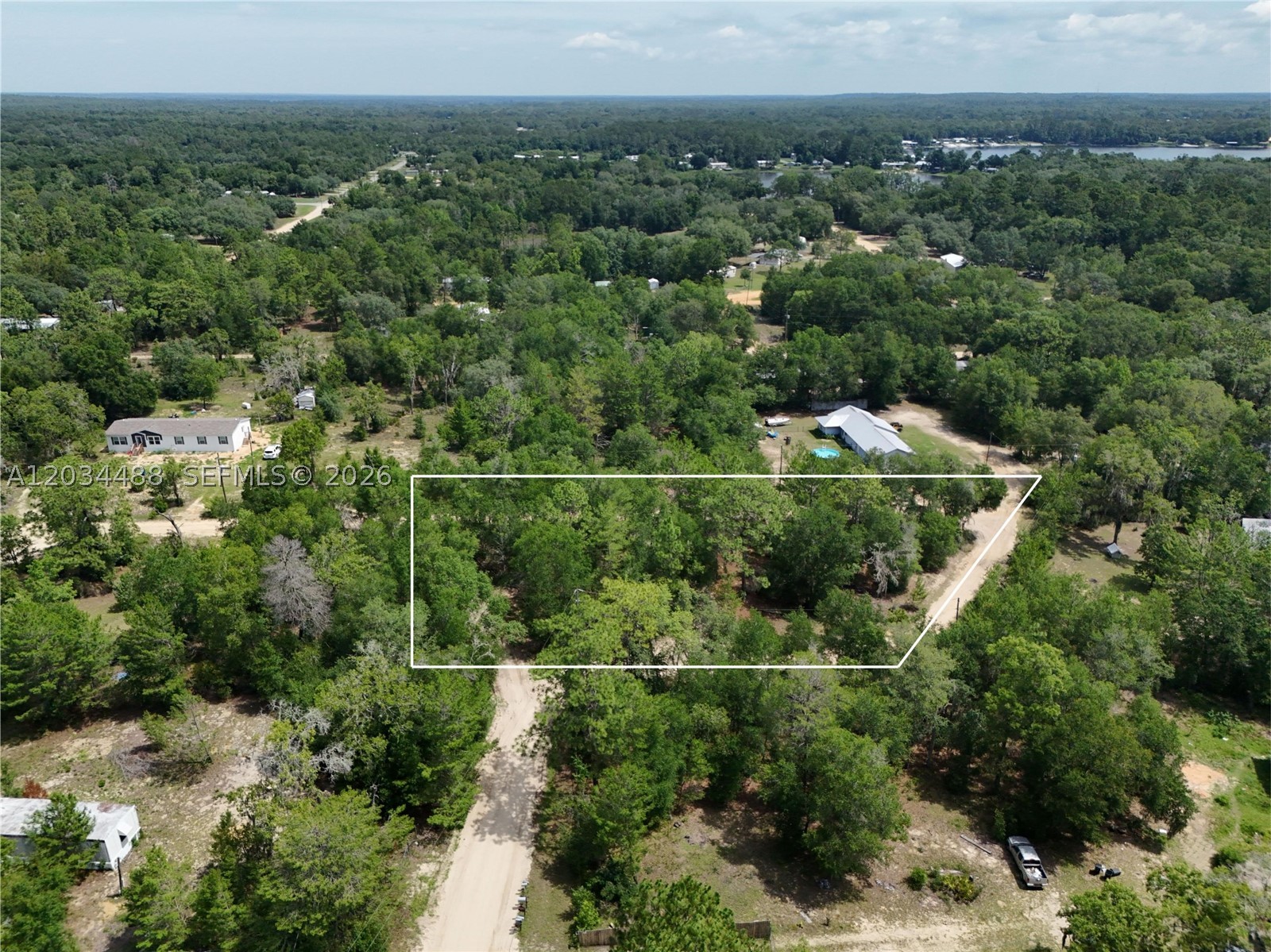 Discover the potential of this spacious vacant lot located in Interlachen, FL, in the established Mirror Lake Forest subdivision. PID: 11-10-24-0000-0150-0160. This property offers a peaceful setting surrounded by Florida's natural beauty, making it an ideal location for a future homesite, seasonal retreat, or investment opportunity. Enjoy the tranquility of rural living while remaining within a reasonable distance of local shopping, schools, recreational areas, and nearby lakes. Whether you're looking to build now or hold for future development, this parcel provides excellent value in a growing area of Putnam County. Utilities in the area are typically serviced by a private well for water and a septic system for wastewater disposal, with electric service available nearby (buyer to verify availability, capacity, and connection requirements with the appropriate utility providers and Putnam County).