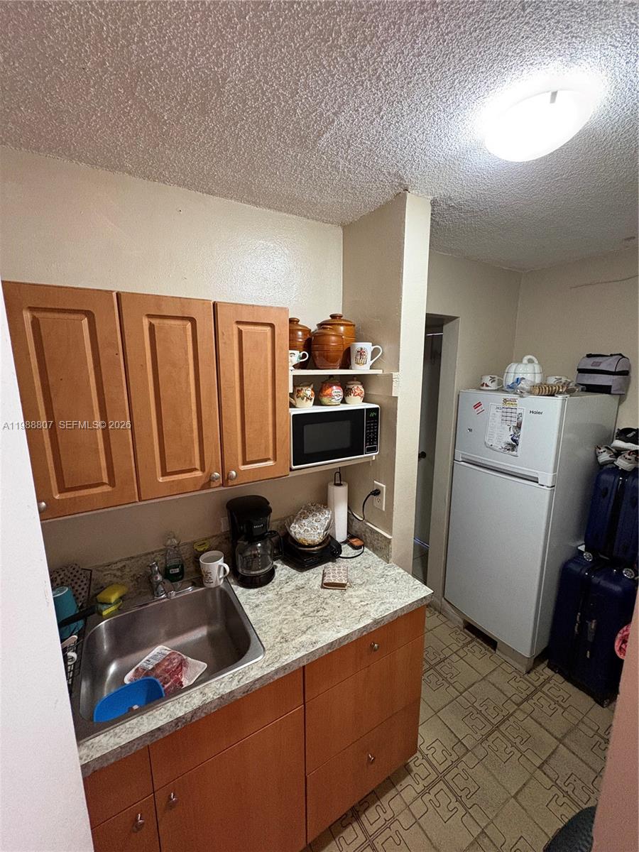 PALM-WEST GARDENS CONDO - Residential