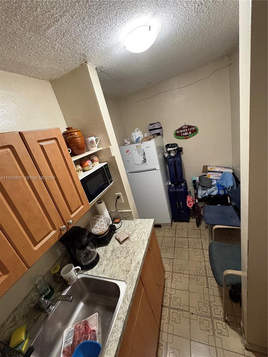 PALM-WEST GARDENS CONDO - Residential