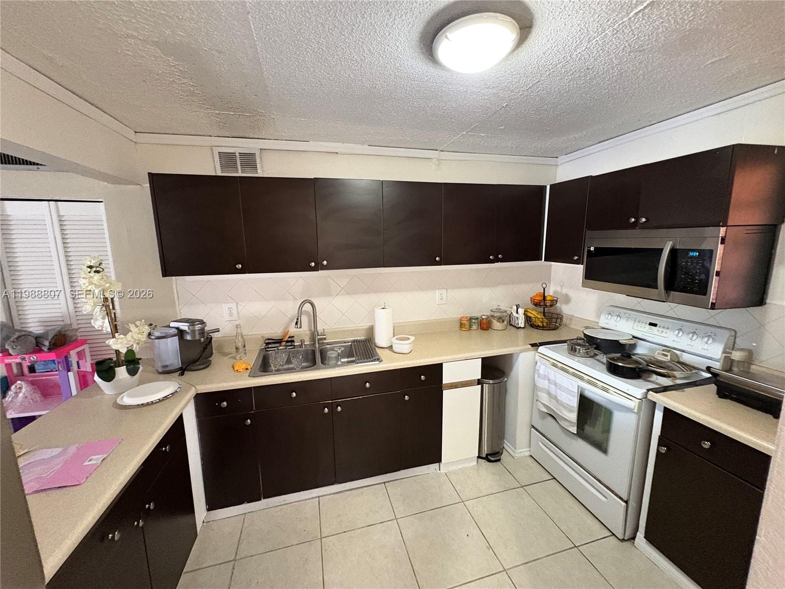 PALM-WEST GARDENS CONDO - Residential