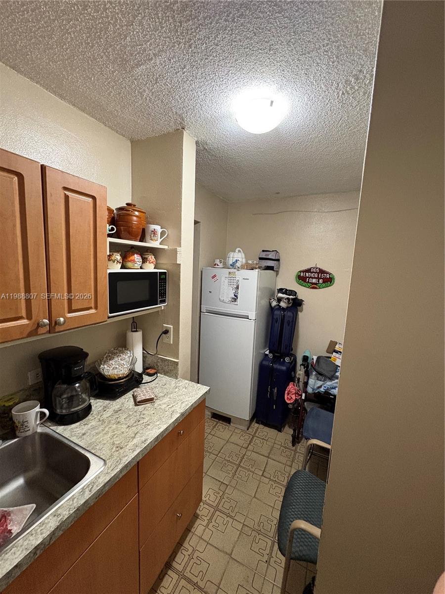 PALM-WEST GARDENS CONDO - Residential