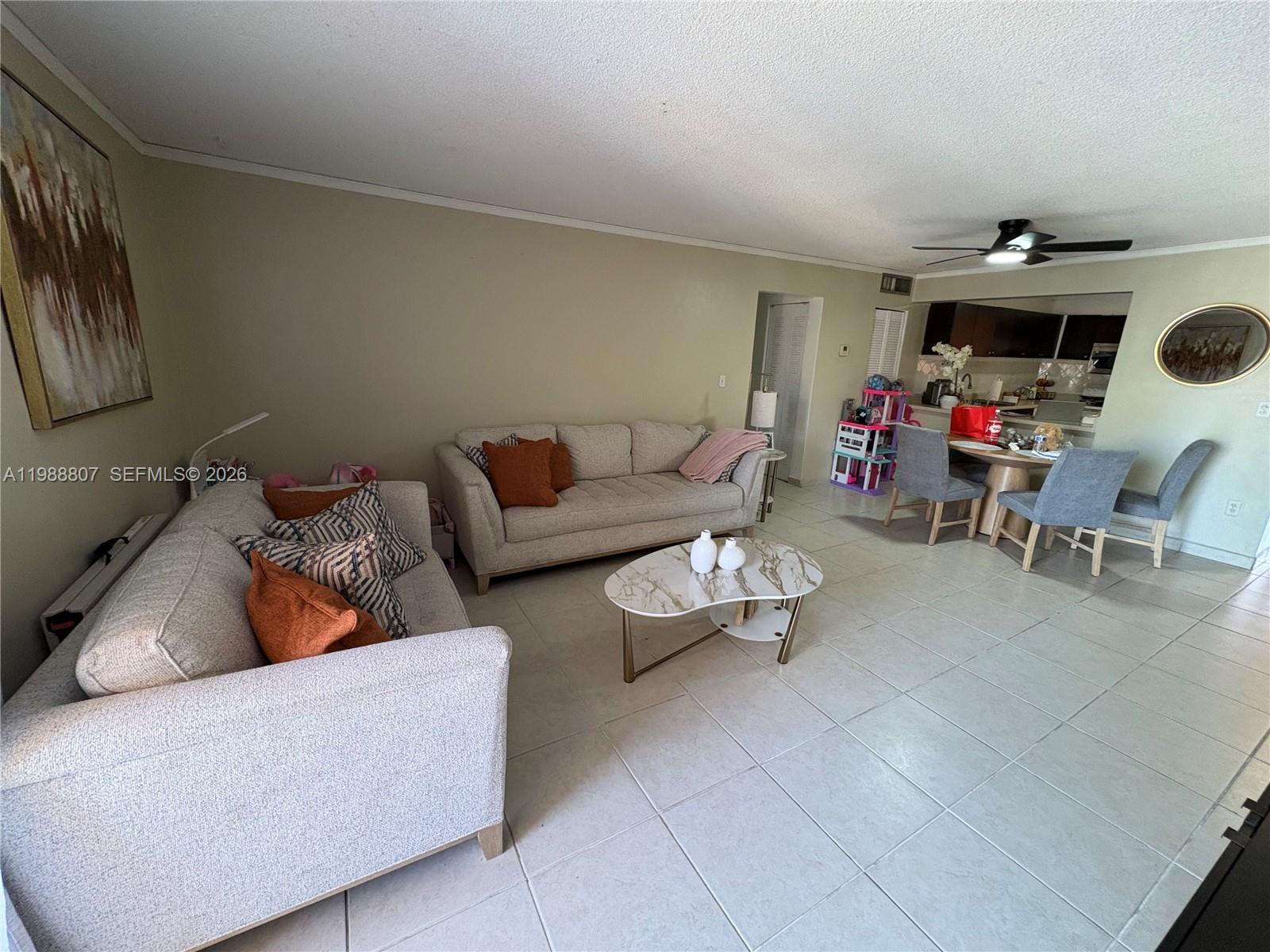 SELLER MOTIVATED!!! Great investment opportunity. Spacious 3-bedroom, 2-bath condo with a versatile layout and strong income potential. The property features a large main living area with generous terrace, ceramic floors throughout, and a separate Studio-style space with independent entrance, kitchenette, and private bathroom. Currently producing rental income, ideal for investors seeking immediate return and flexible use. Conveniently located near major highways, shopping centers, schools, and restaurants. Call listing agent for details and showing instructions. Bring all offers.