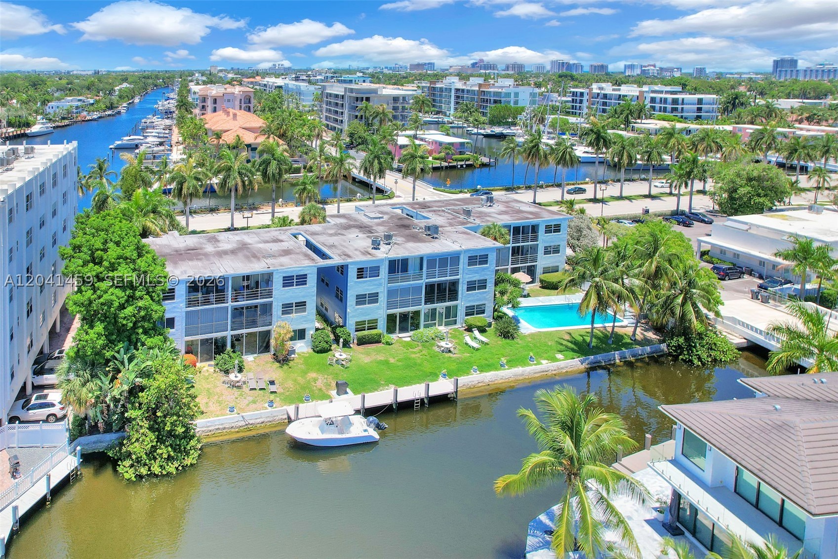 Wake up to waterfront views and step outside to the pool from this beautifully renovated corner-unit residence on Las Olas Boulevard. Nestled within a boutique waterfront community with direct Intracoastal access, this 2-bedroom, 2-bath home offers a rare combination of style, comfort, and location.
Thoughtfully redesigned with a contemporary coastal aesthetic, the residence showcases a stunning custom kitchen featuring designer-inspired cabinetry, countertops, stainless steel appliances, and a custom movable island designed for both functionality and entertaining. Both bathrooms have been meticulously updated with designer tile, modern fixtures, and spa-inspired finishes.
Natural light fills the home through additional corner-unit windows, while the enclosed patio provides the perfect place to relax and enjoy views of the pool, tropical landscaping, and waterfront setting. Partial impact windows and doors provide added peace of mind.
Residents enjoy assigned parking with additional spaces available, community dockage with direct Intracoastal access, and an unbeatable location just moments from Fort Lauderdale Beach, Las Olas dining, shopping, and entertainment.
A truly turnkey waterfront retreat where thoughtful design, modern updates, and a sought-after location come together to create an exceptional South Florida lifestyle.
Schedule your private showing today—opportunities to own a renovated waterfront residence in this location are rare.