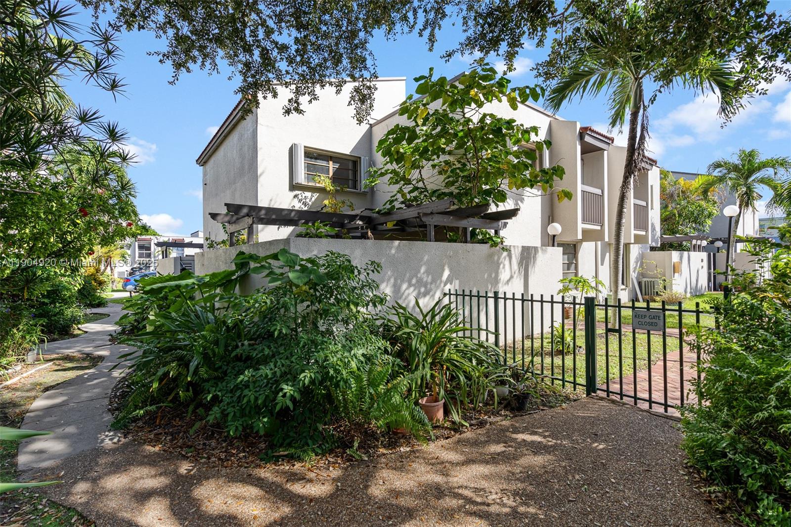Amazing opportunity to live in the centrally located & sought after OASIS Community!! Private, gated & secure community, conveniently located close to FIU, Miami Int'l Airport, University of Miami, Coral Gables & Downtown Dadeland. This 2 story corner townhome features 3 bedrooms, 2.5 baths, fantastic natural light pouring thru the 2 sliding glass doors which lead to your private patio. The townhome is located just steps from one of the 2 community pools. Additional features include full size washer & dryer in the unit, 2 assigned parking spaces, plent of storage/closets, doggy park & shaded community walkways. A+ elementary & middle schools, near shopping, restaurants & county parks. Basic Cable & Wifi are included in the rent. Easy to see!! Available for move in after December 20th.