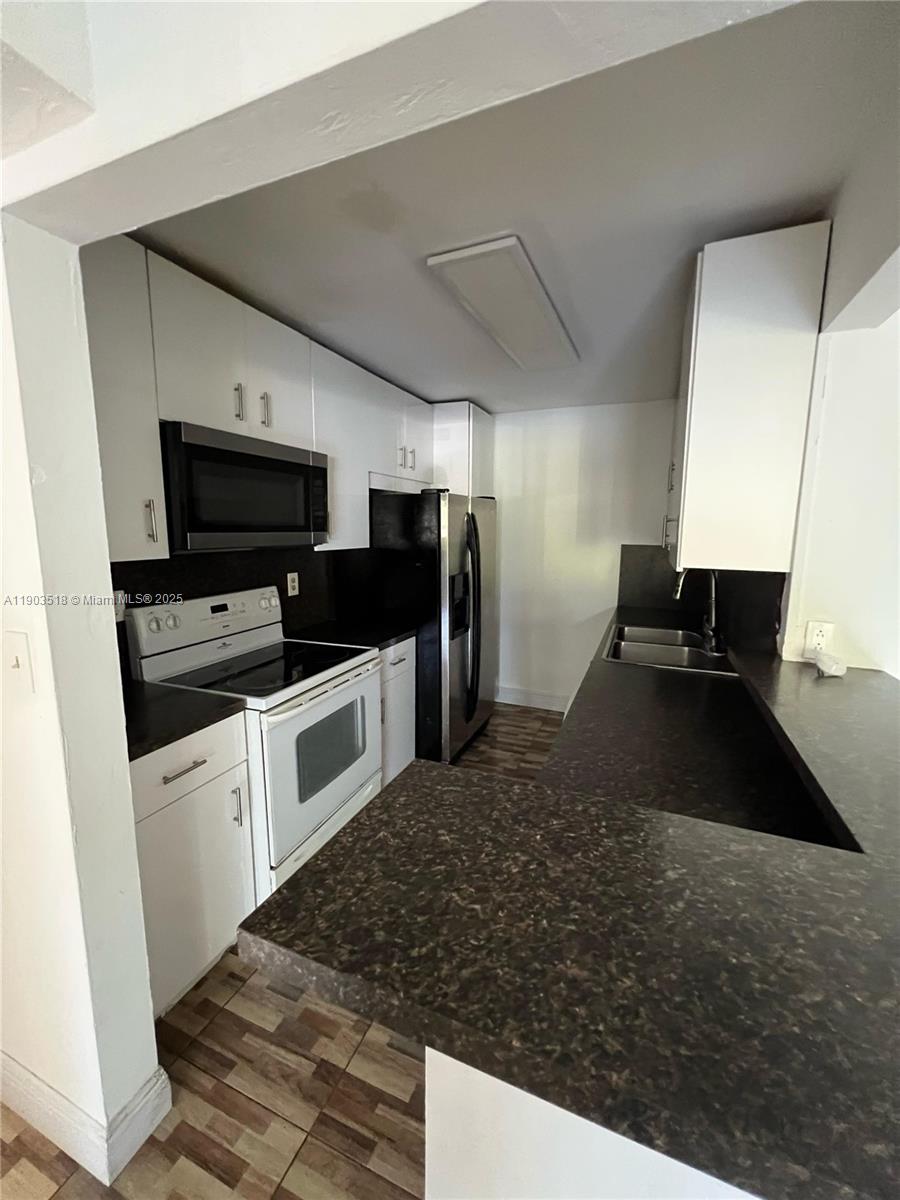 KENDALL ACRES CONDO BLDG - Residential Lease