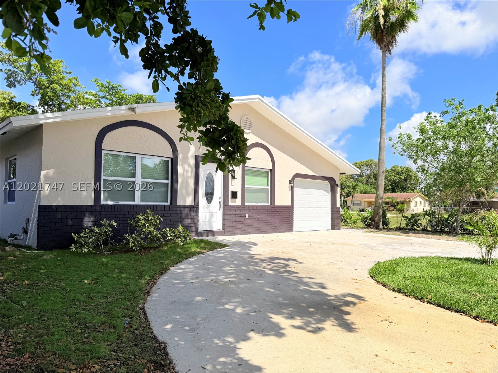 This unique GEM is in a league of its own in this area. Luminous elegant one story single family in the fast-growing city of Pompano Beach with 4 bedrooms and 2 bathroom one car garage and circular driveway.Newly Roof 2020.New impact exterior doors and windowes with permit.New garage door with permit. New water heater.New wiring in kitchen, laundry and bathrooms.New A/C.New smoke detectors.New flooring Tile on entire living room and Wood laminate in Bedrooms.New bathrooms full remodeled w/new vanity, glass doors. New kitchen with Quartz counter top on hard wood Cabinets with New Stainless steel Appliances.New water pipe entire house and New Plumbing & Electrical fixtures.New interior and exterior doors.New Painting entire house.This house stands out as a top opportunity in Pompano Beach area and just only 3 miles from the vibrant Pompano City Center and beaches, dinning, shopping and more. Don’t miss this opportunity