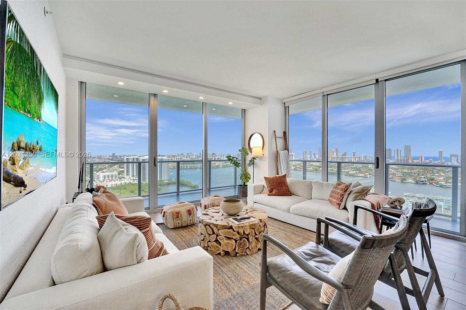 Spectacular 3 Bed/ 3 Bath FURNISHED corner unit in the best line at the new luxury condo THE HARBOUR in North Miami. This high-floor corner unit has an expansive floor plan with a modern open kitchen, a comfortable dining and living area, and a wide-open balcony. Enjoy majestic views of the Bay and Sunny Isles' magnificent skyline from floor to ceiling windows throughout the condo. THE HARBOUR is a full-service building offering concierge, Spa, Fitness Center, Pool, Kids Room, Tennis and Basketball courts, open Kid's Playground, Picnic area, Bikes on site, Valet and much more! (Realtors see Broker remarks)