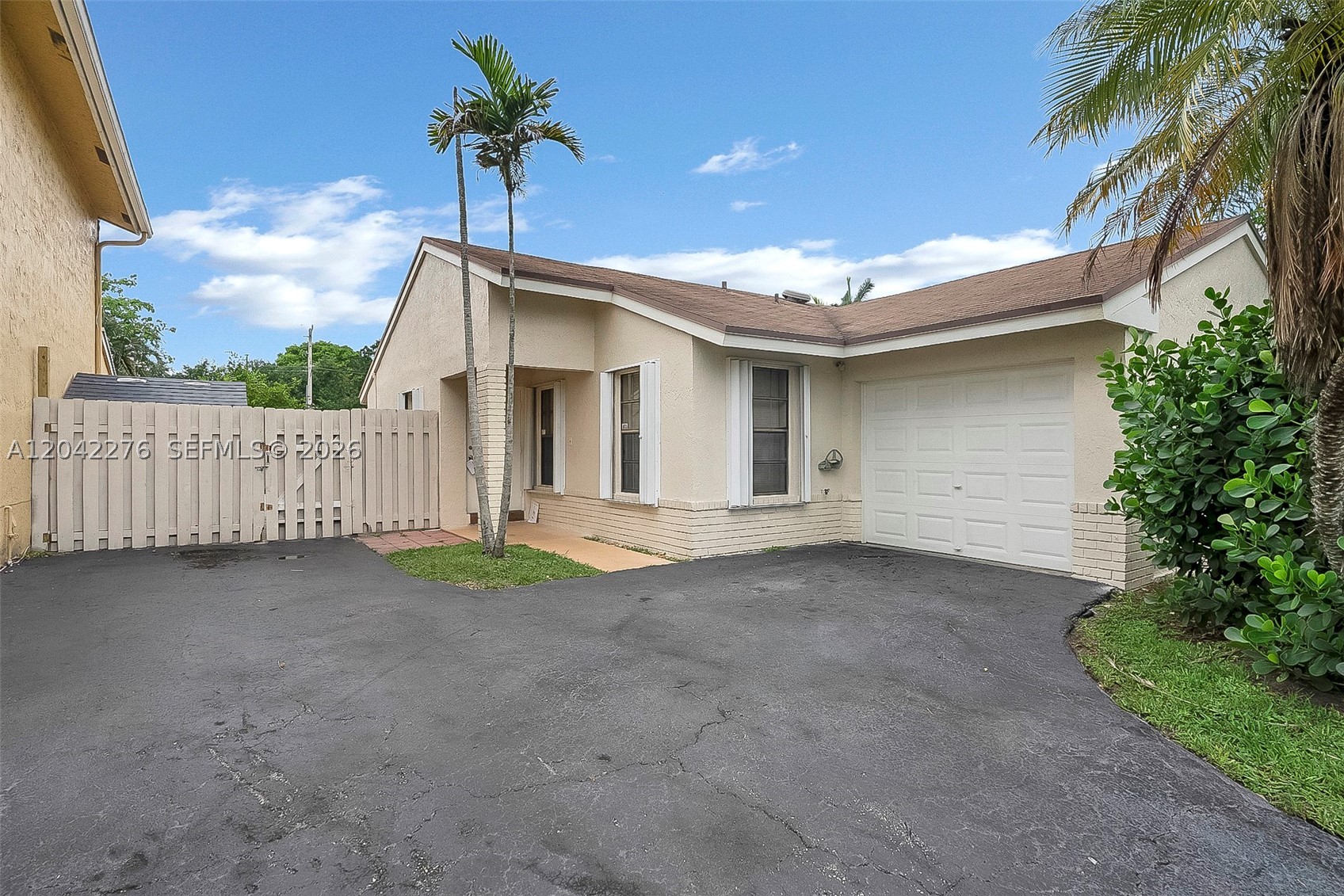 Welcome to 681 Thornridge Avenue, a beautifully maintained single-family pool home located in the heart of Davie. This inviting residence offers a bright and open layout with vaulted ceilings, updated flooring, neutral finishes, and comfortable living spaces designed for everyday enjoyment. The kitchen features modern cabinetry, granite countertops, stainless steel appliances, and an eat-in dining area, creating the perfect space for meals and entertaining. The spacious primary suite offers a walk-in closet and private bathroom, while the additional rooms provide flexibility for bedrooms, office space, or guests. Step outside to your private backyard retreat featuring a free-form pool and plenty of space to relax, entertain, and enjoy South Florida living. Conveniently located near shopping, dining, highways, parks, and schools. Available for annual lease. First, last, and security required.