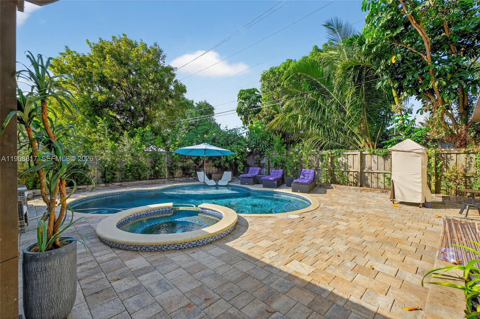 Beautifully updated 3-bedroom, 2.5-bathroom single-family home featuring new floors throughout, a modern upgraded kitchen, and an incredible backyard built for entertaining. Enjoy a spacious outdoor kitchen, covered patio, and sparkling pool, creating the perfect setting for gatherings, barbecues, and relaxing weekends. This property blends indoor comfort with outdoor lifestyle, ideal for homeowners who love to host. Conveniently located just 15–20 minutes from Miami’s top landmarks including Wynwood, Brickell, Miami Beach, and the Design District. Excellent investment or move-in ready home in a rapidly growing neighborhood.