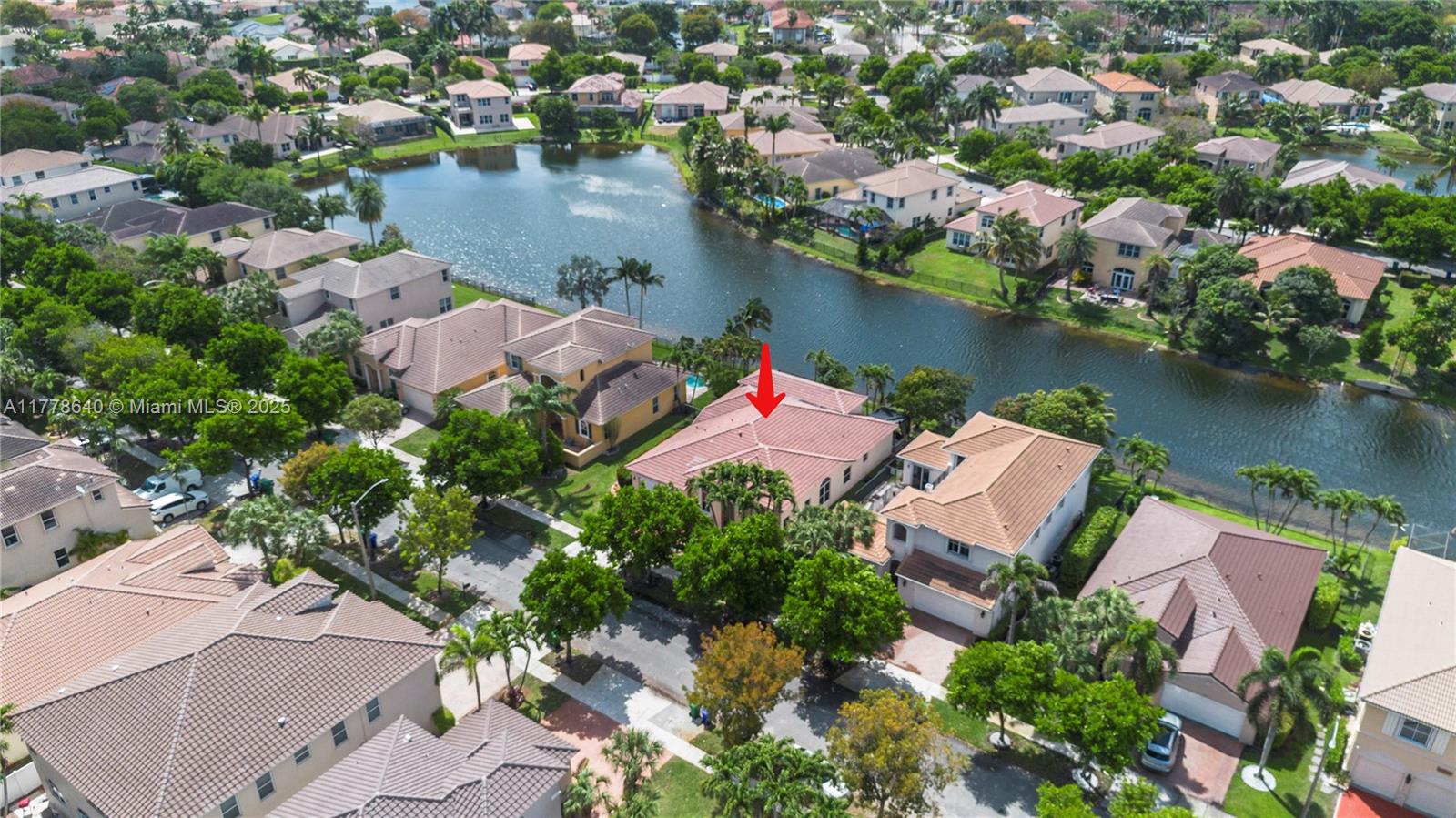 Beautiful lakefront home in the highly sought after gated community of Biltmore Estates in Monarch Lakes. This charming waterfront property offers the perfect blend of comfort and style. With 4 Bedrooms, 3 Bathrooms, and a 8,016 square-foot lot, this home provides plenty of room to live and entertain.  It has an ideal open floor plan, high ceilings and a large covered patio with a built-in grill. The community features a guard gate for added security, as well as a playground and pool for residents to enjoy. This exceptional property will not last!!