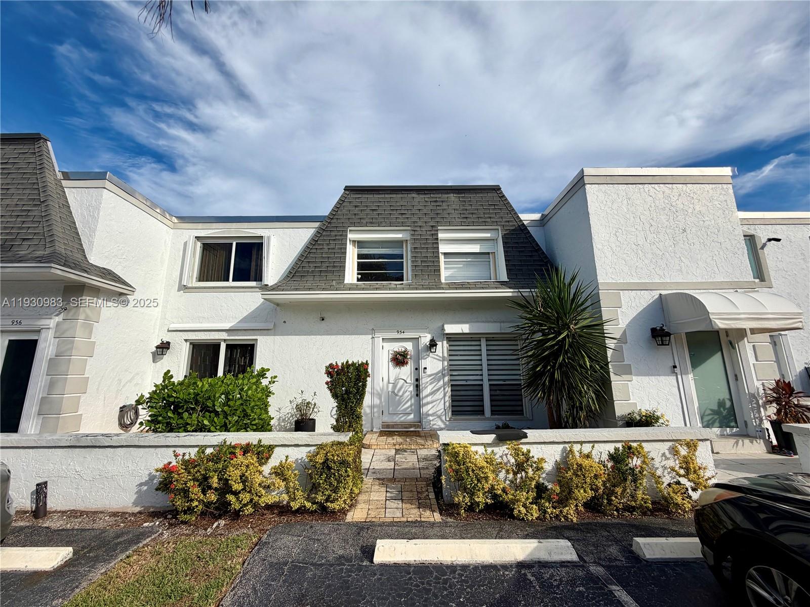 Beautifully updated townhouse located in a rapidly developing area of Hallandale Beach, just minutes from the ocean***NEW ROOF***This home features a stylish open-concept kitchen with granite countertops and stainless steel appliances, seamlessly flowing into a spacious living area with smooth ceilings (no popcorn) and abundant natural light***A true highlight of this property is the fully designed private backyard, perfect for entertaining and outdoor living. The backyard includes outdoor furniture, a pergola, and additional storage, creating a functional and inviting outdoor space rarely found at this price point***The primary bedroom offers a large private balcony, adding to the home’s indoor-outdoor appeal. The community offers low HOA, making this property an excellent value***Conveniently located close to the beach, shopping plazas, Publix, Walmart, and a wide variety of restaurants. Hallandale Beach continues to see strong growth and new development, which adds long-term value to the area and makes this an attractive option for both end-users and investors.